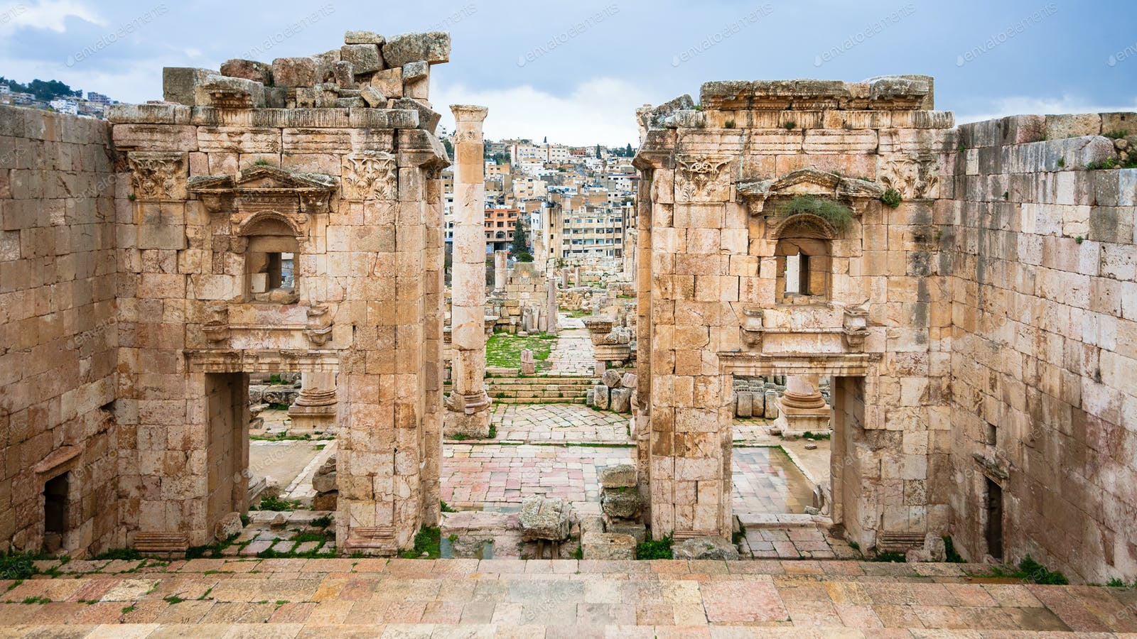 1600x900 view of Jerash through Gates of Artemis temple photo by vvoennyy on Envato Elements