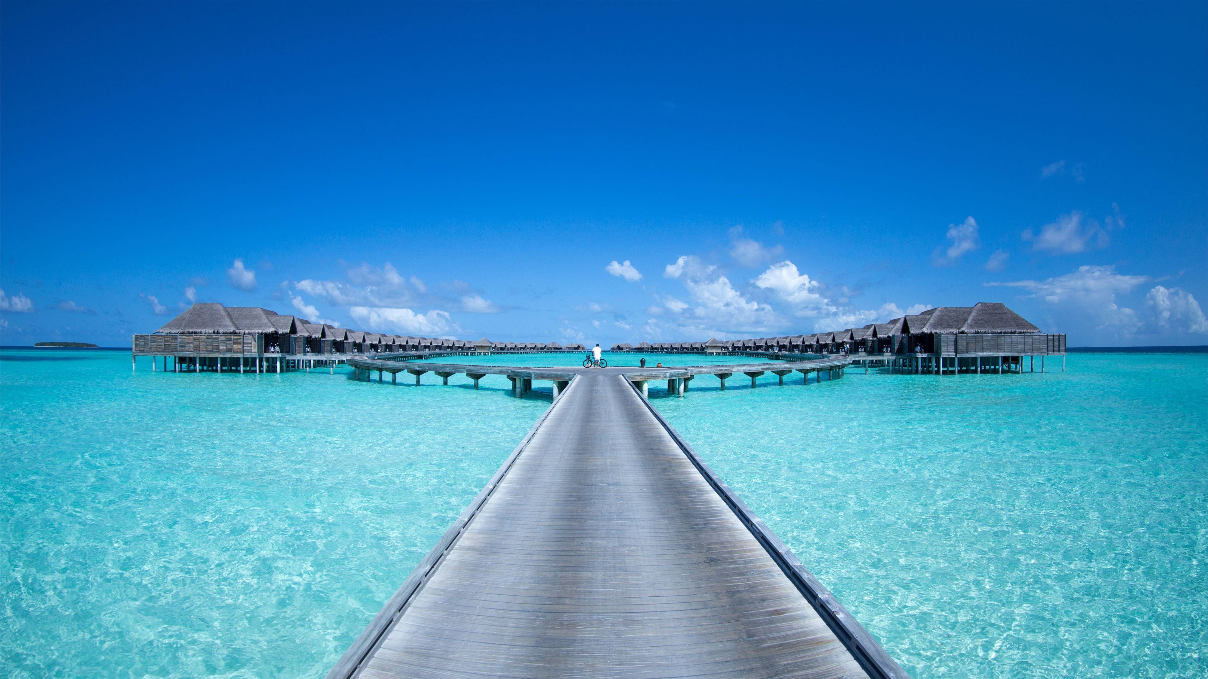 4096x2304 gray beach dock under blue skies MacBook Pro Wallpaper Download