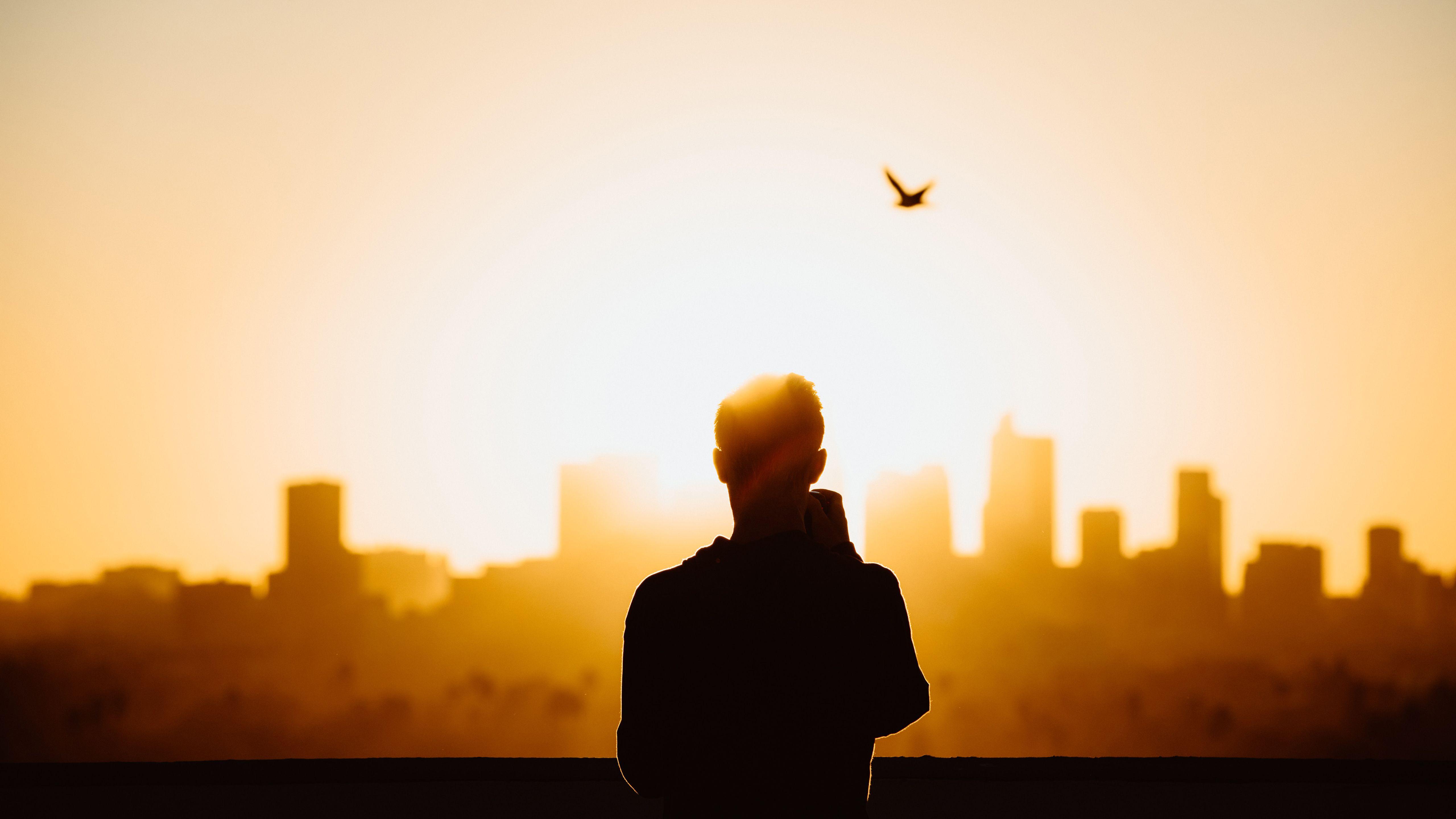 5120x2880 Wallpaper For Computer Silhouette Man Standing In Front Of Sun Raise 4K 5K HD Desktop Wallpaper