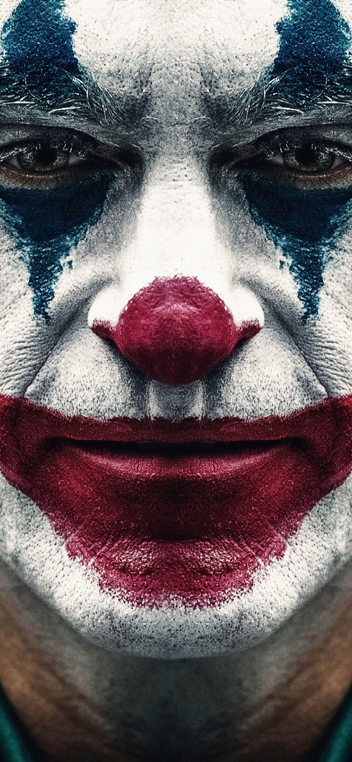 1170x2532 joker 2019 joaquin phoenix clown iPhone 12 Wallpaper Free Download