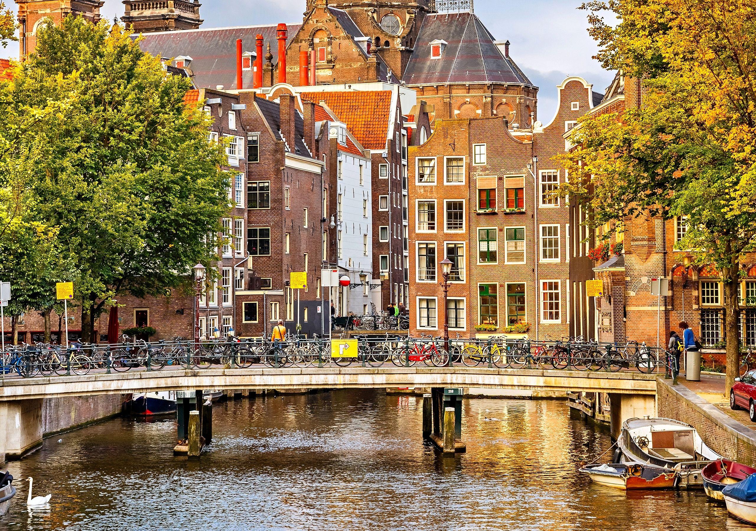 2560x1800 Image Amsterdam Netherlands bike Bridges river Cities 2560x1800