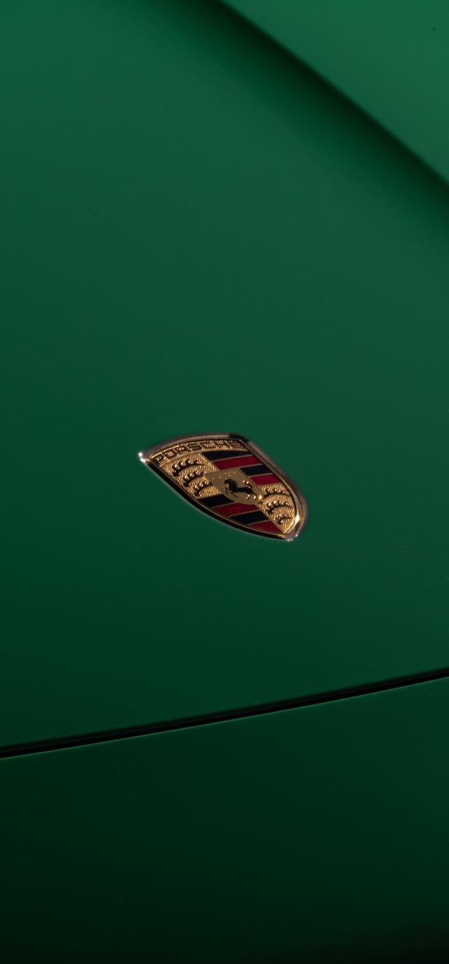 640x1374 Took a photo of a taycans badge so now i can make the base car color anything with lightroom. If anyone wants a wallpaper in very specific color, dm me og color