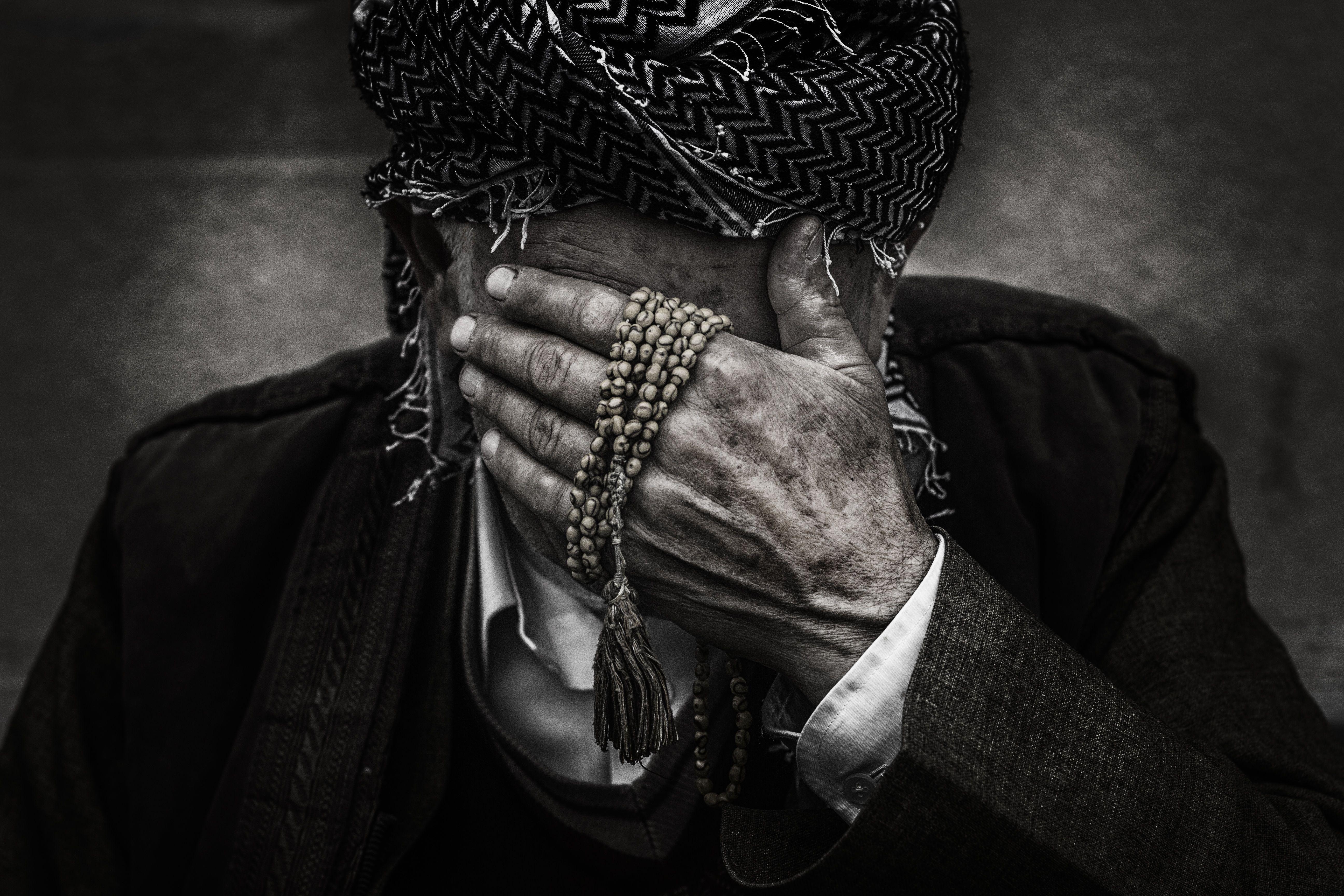 5184x3456 Person Putting Palm on Face While Holding Prayer Beads · Free