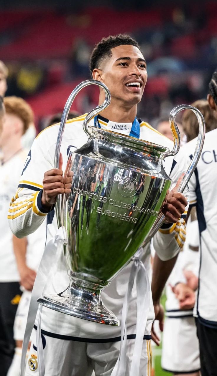 736x1277 Jude Bellingham with UCL CUP