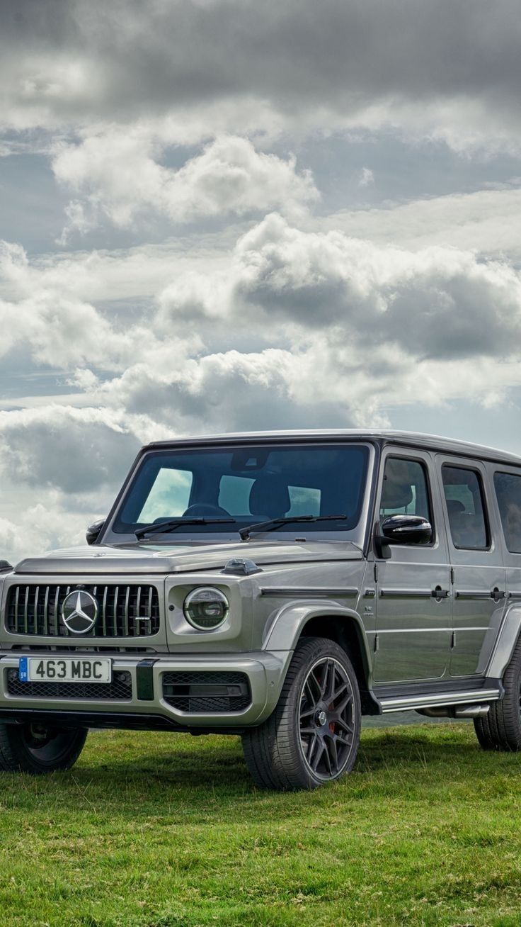 736x1308 Silver Mercedes G Class Parked On The Grass. Mercedes Benz G 63 Amg Wallpaper, Mercedes G Wagon Wallpaper Printable, G63 Amg Wallpaper Laptop