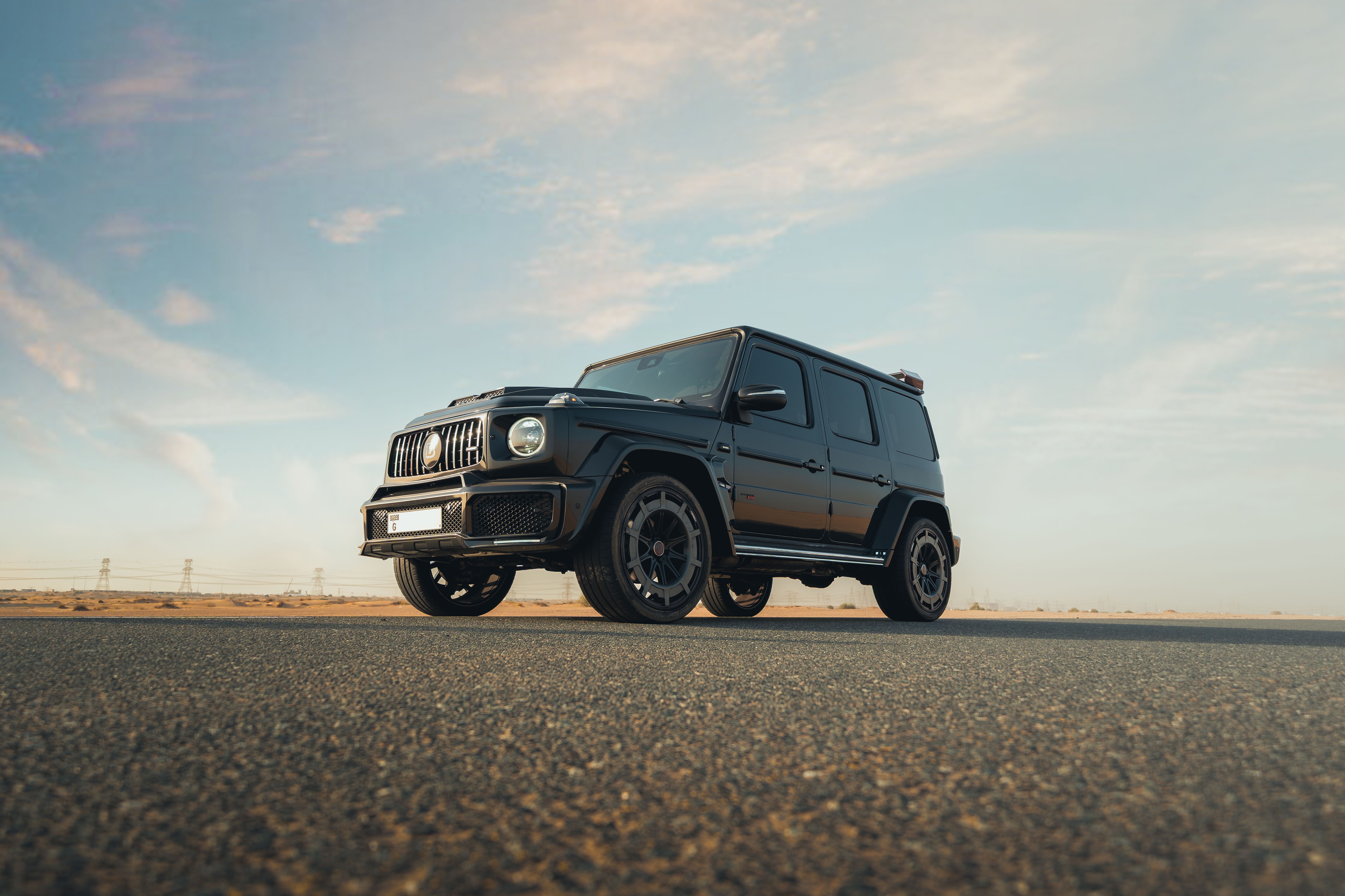7007x4671 Luxurious Mercedes G Wagon On Scenic Hilltop · Free
