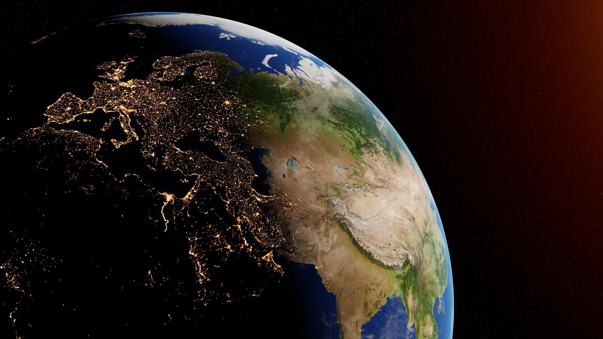 1244x700 Day and night on Earth planet viewed from space showing the lights of Europe, Middle east, West asia and North Africa. 3D rendering. Elements of this image furnished by NASA. 11040507 Stock