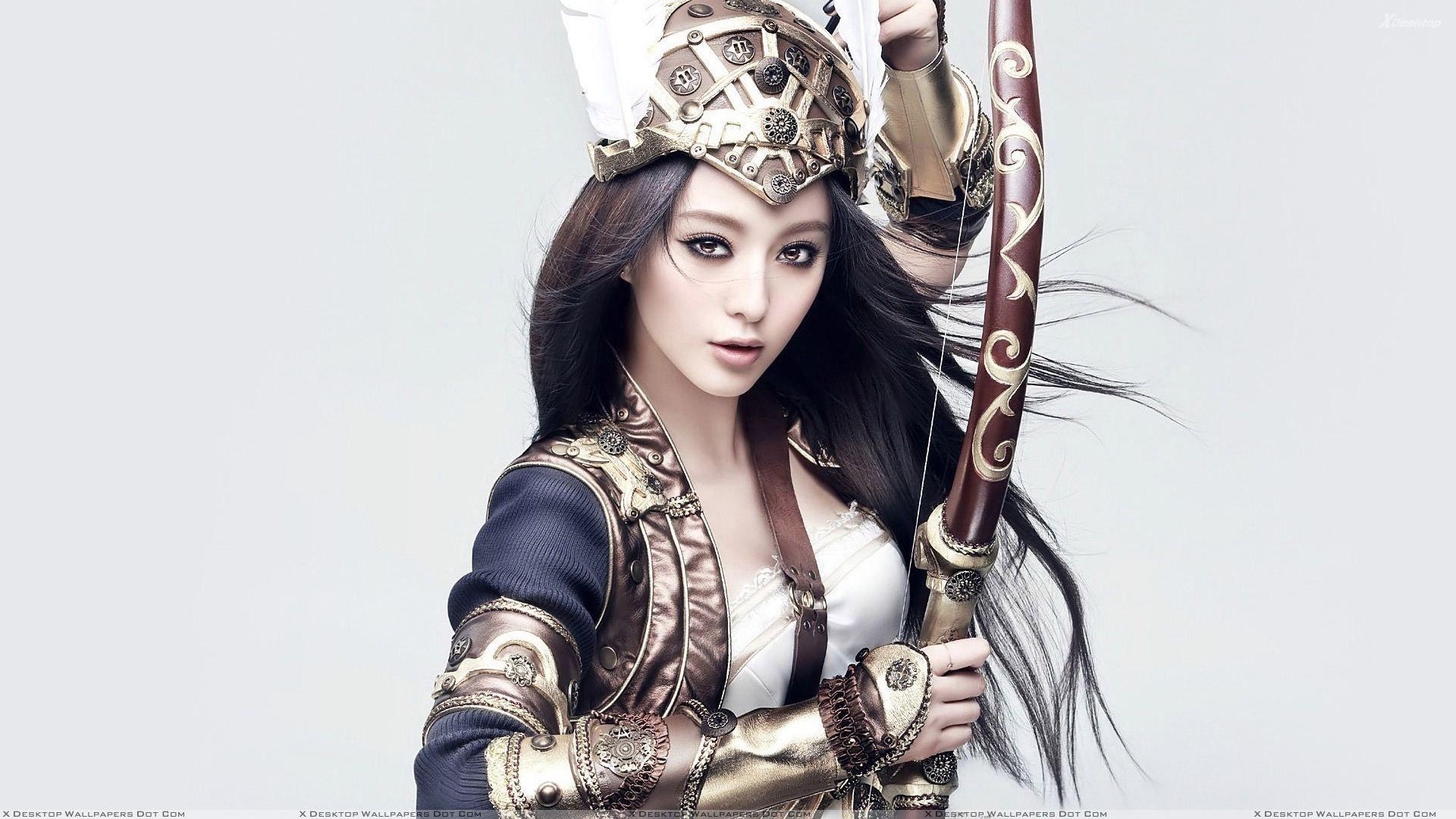 1920x1080 Fan Bingbing Bow And Arrow In Hand Wallpaper