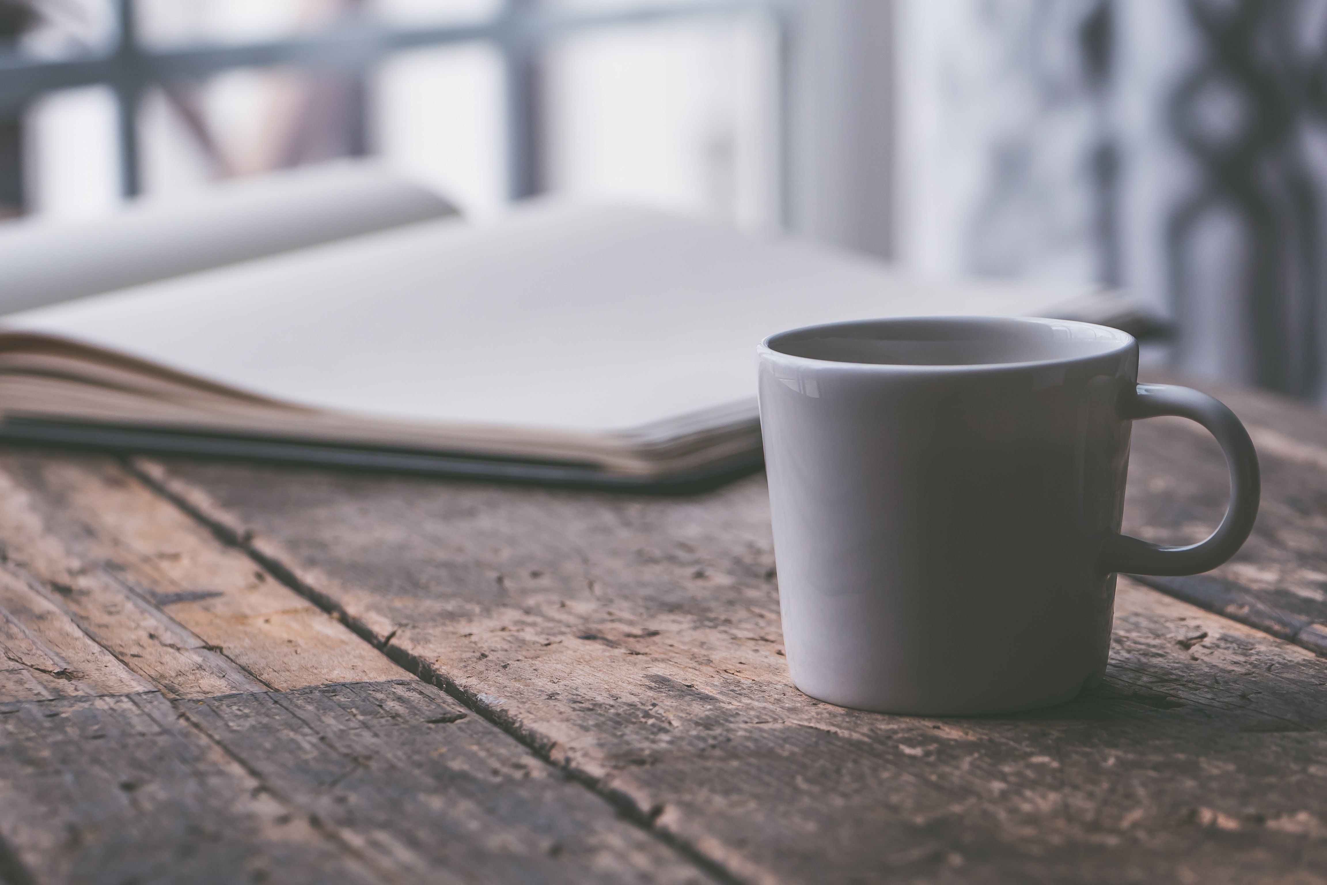 4608x3072 Cozy Coffee and Book Moment at Café in Houston · Free