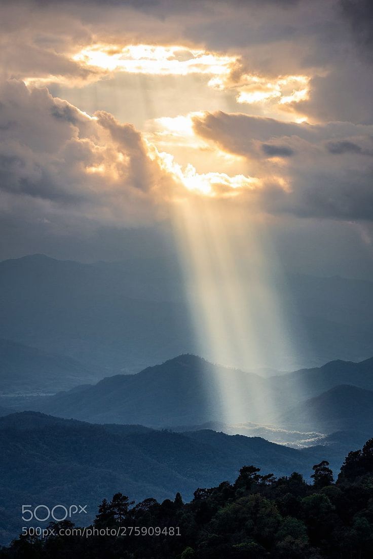 736x1104 Sunlight shining through hole of clouds to dark mountain, sun rays shining through tree HD phone wallpaper