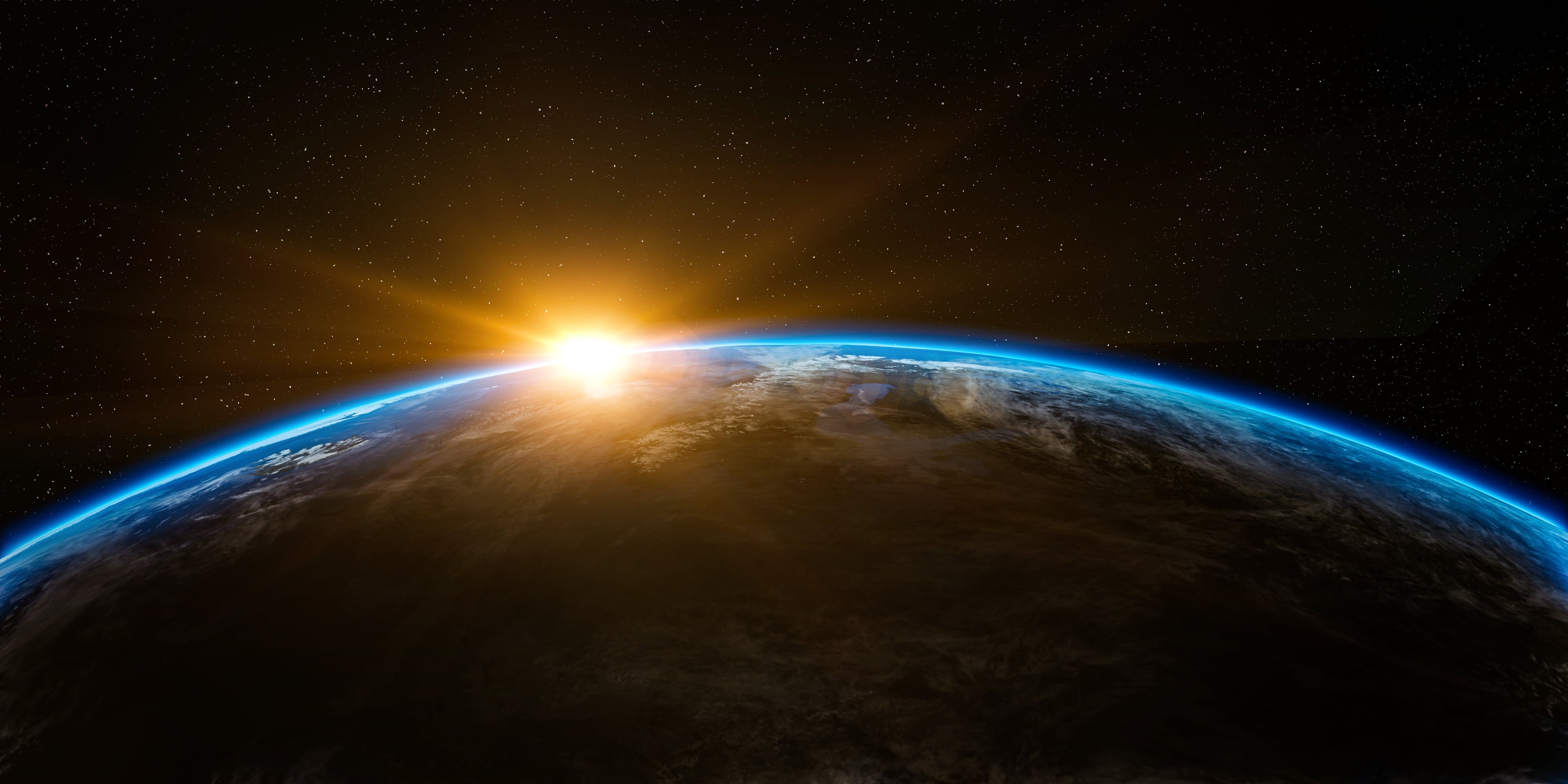 4000x2000 Sun rays coming behind earth HD wallpaper
