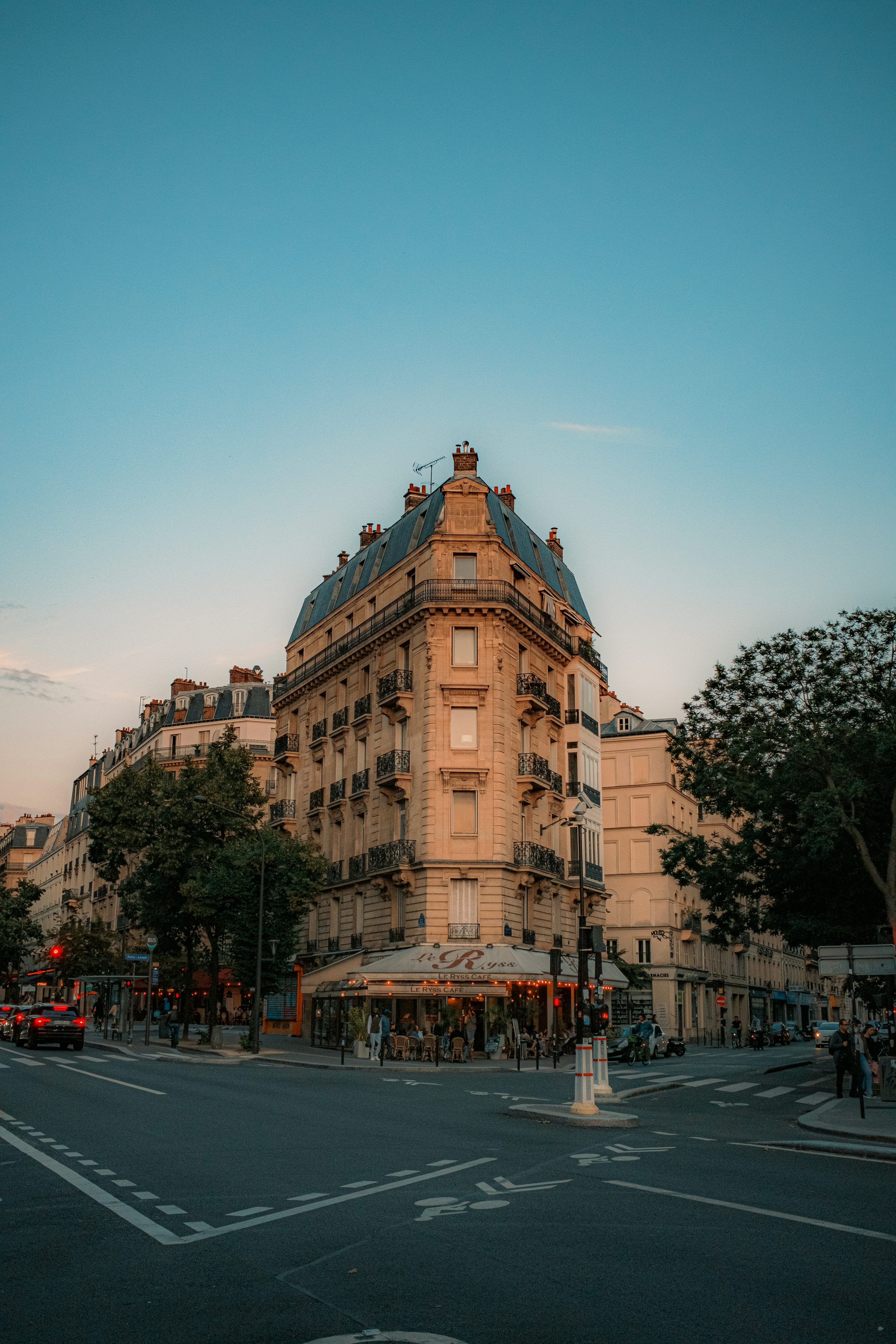 3000x4500 A street corner with a building in the background photo