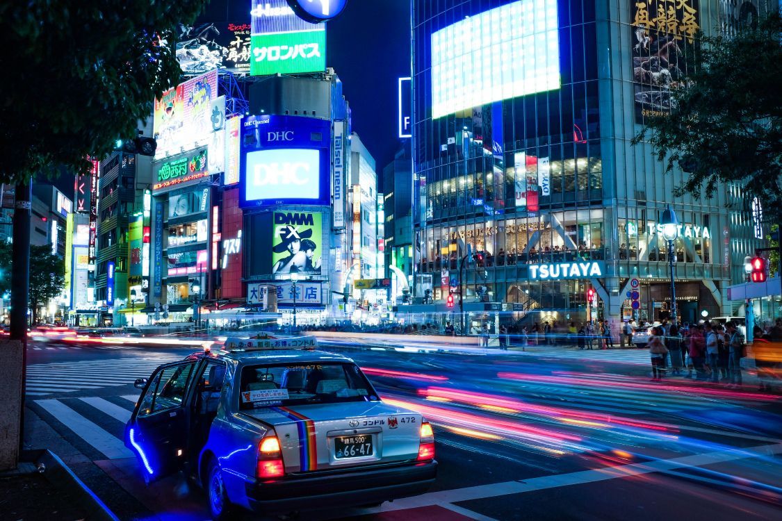 1125x750 Wallpaper Cars on Road Near Buildings During Night Time, Background Free Image