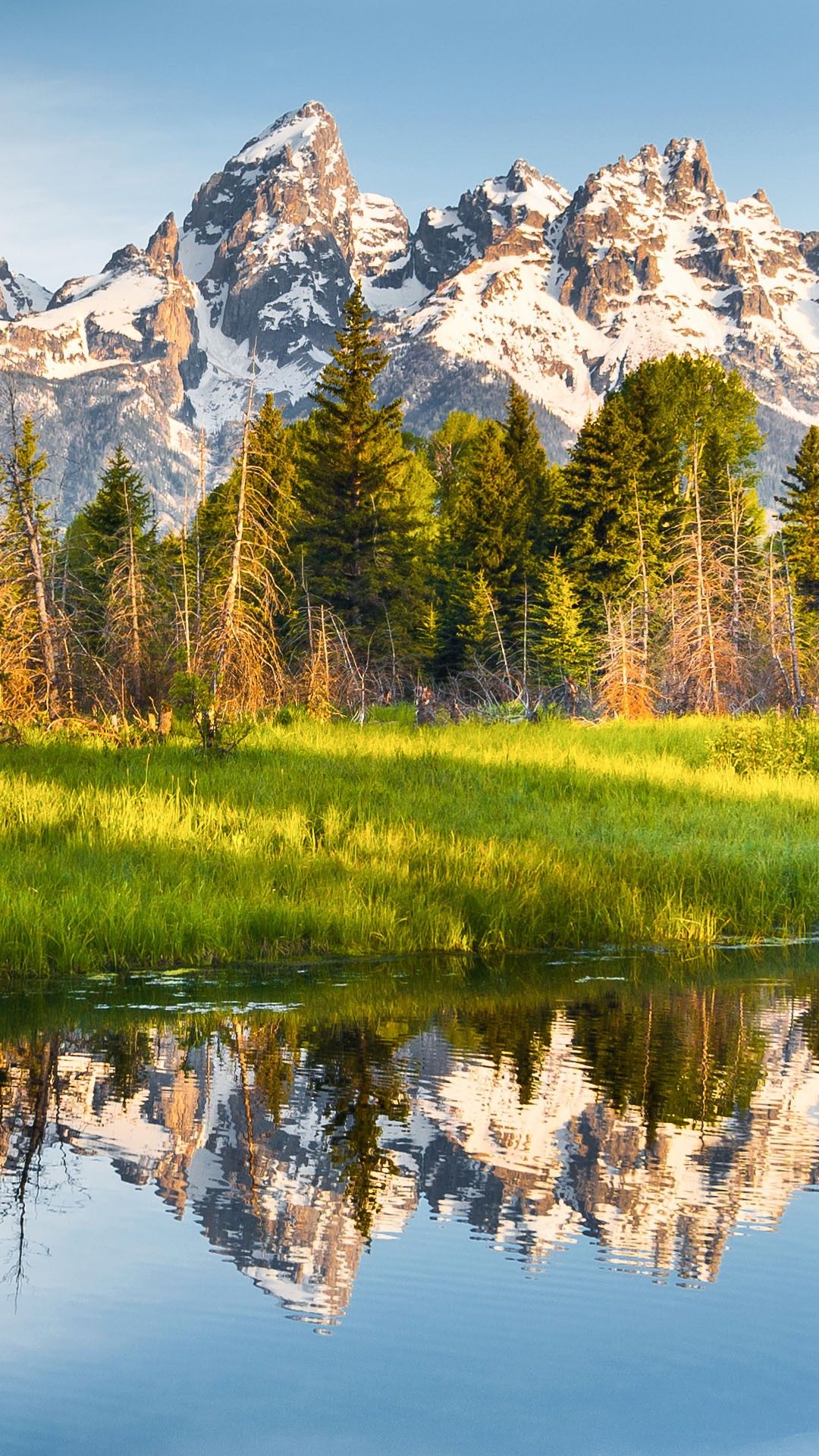 1080x1920 A mountain range with its reflection, Grand Teton National Park, Wyoming, USA. Windows Spotlight Image