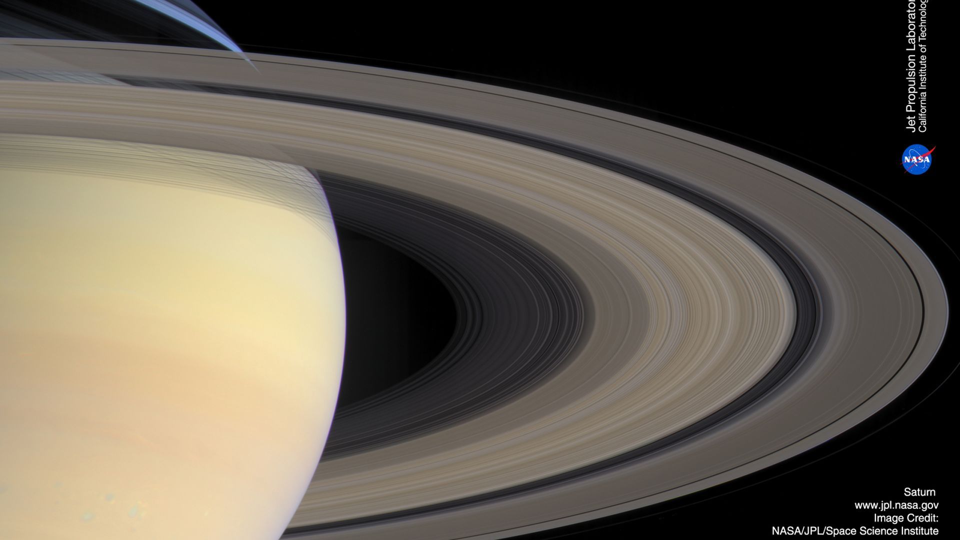 1920x1080 Saturn's Sweeping Rings Space Wallpaper
