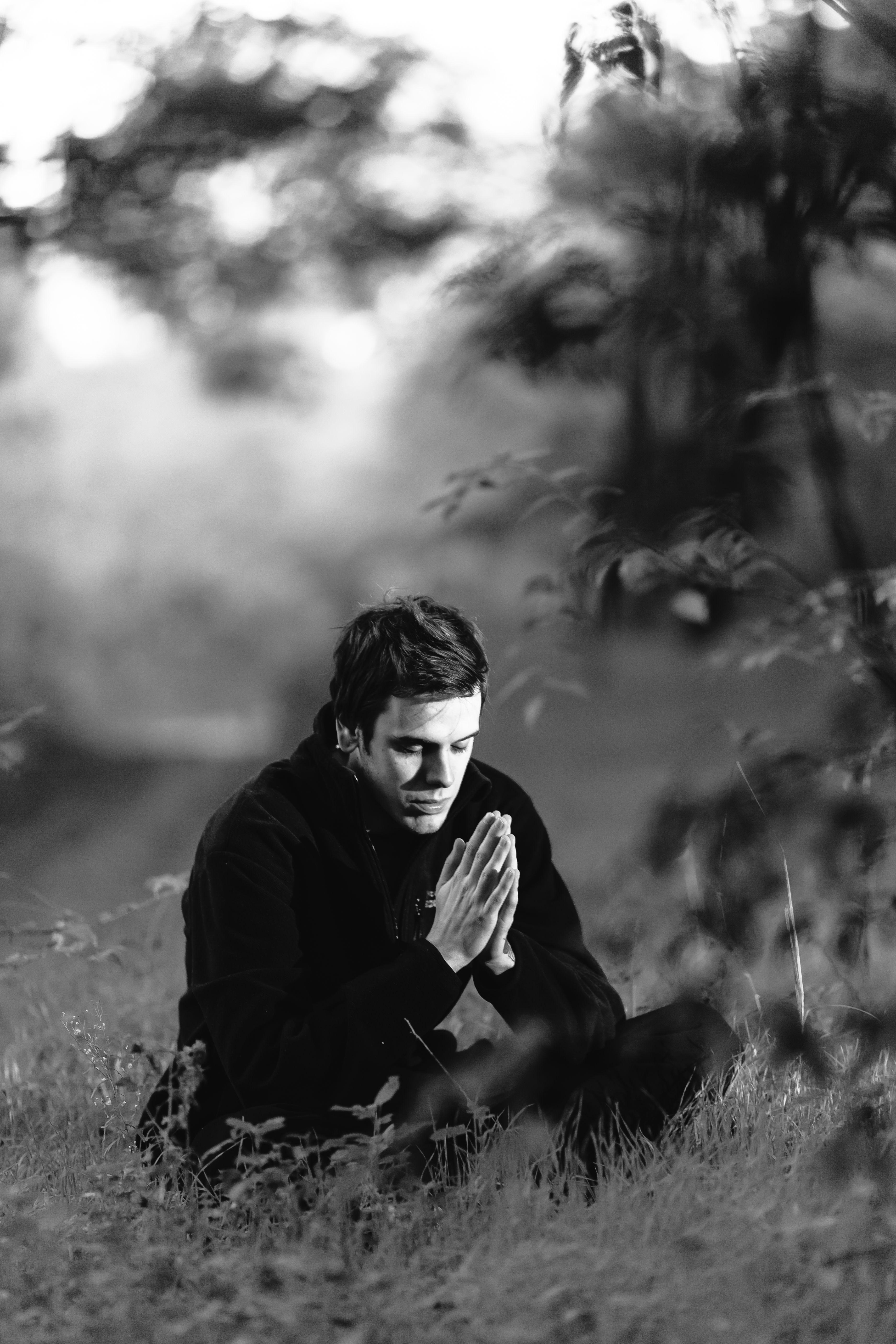 3744x5616 Grayscale Photography of Man Sitting on Grass Field · Free