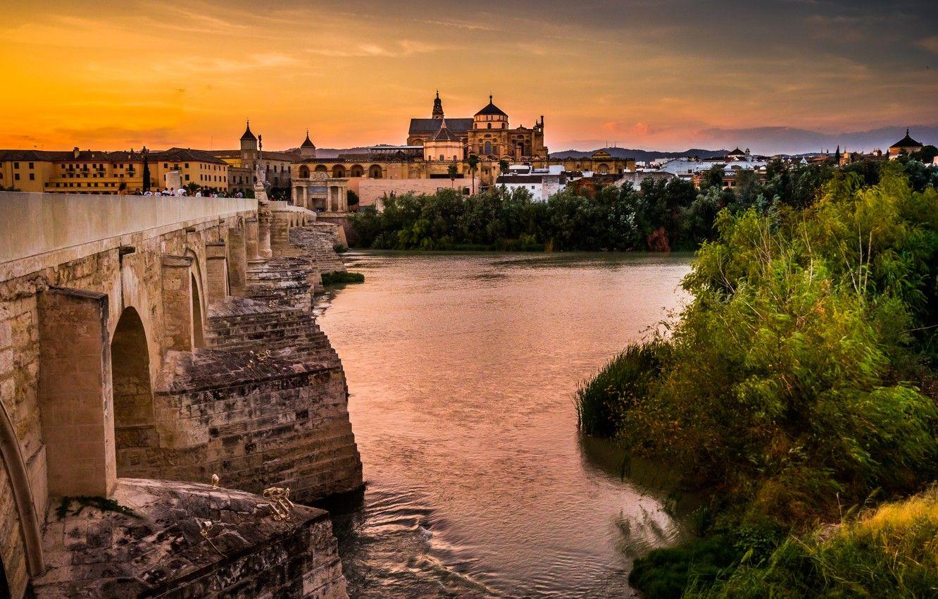 1332x850 Wallpaper sunset, bridge, the city, river, building, home, Church, Spain, Andalusia, Cordoba, Of the Guadalquivir image for desktop, section город