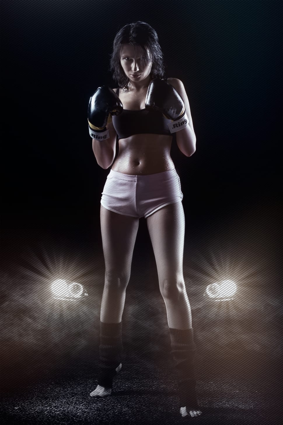 970x1455 woman in white shorts black sports bra and black boxing gloves free image