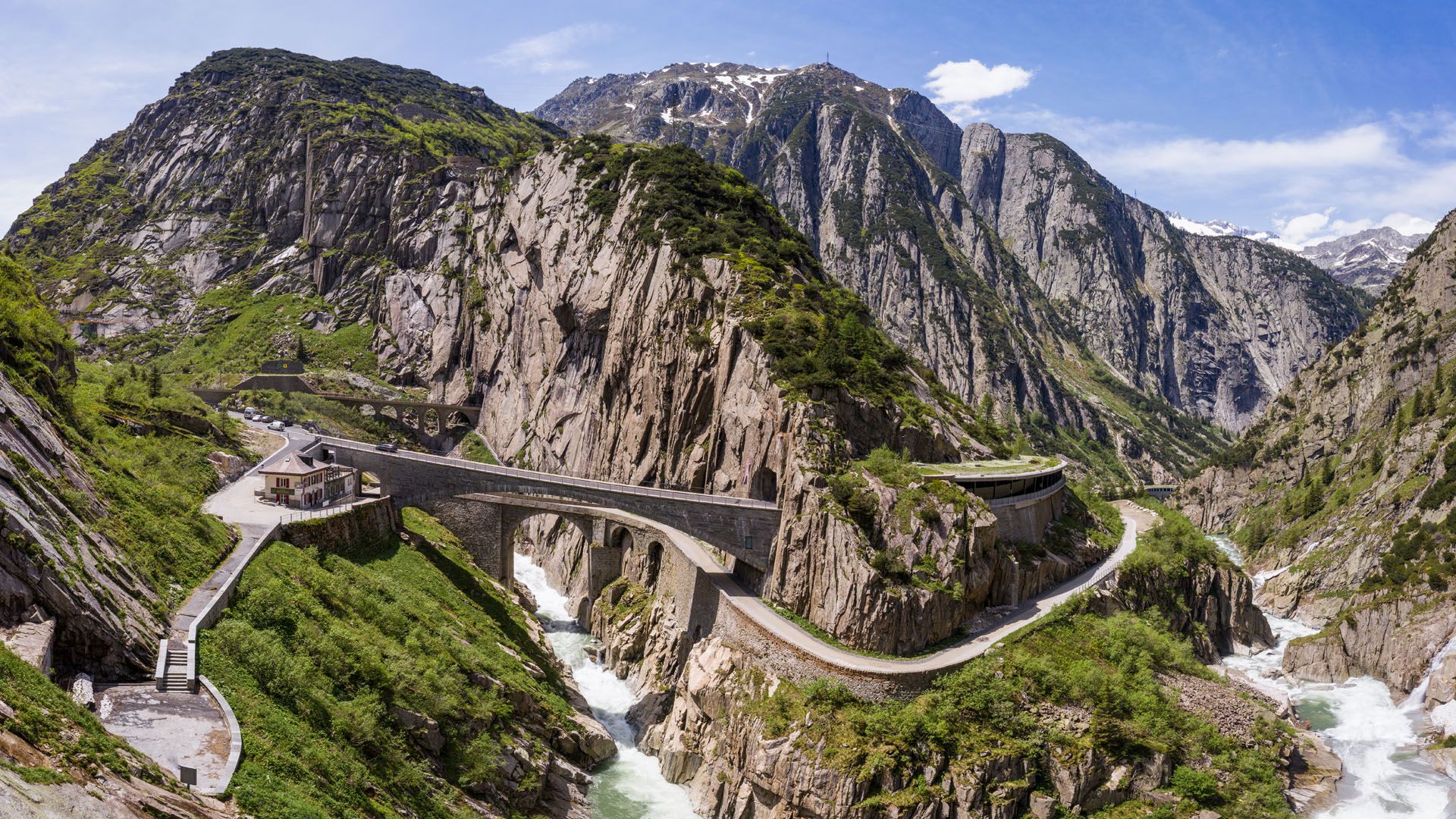 1920x1080 Aerial view of Teufelsbrucke or Devil's bridge along Gotthard pass, Canton Uri, Switzerland. Windows Spotlight Image