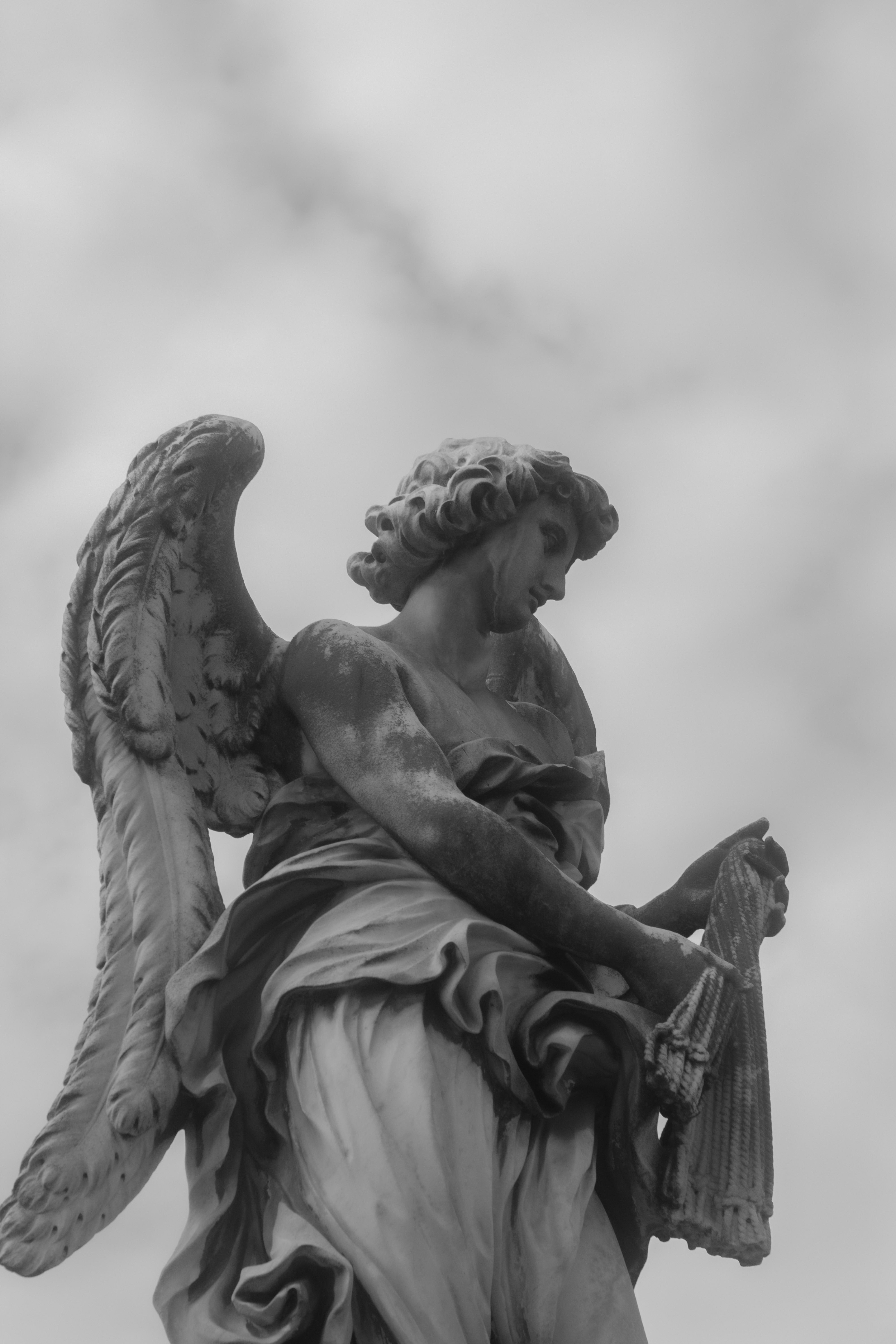 4000x6000 Low Angle Shot of One of the Angel Statues on the Ponte Sant Angelo in Rome, Italy · Free