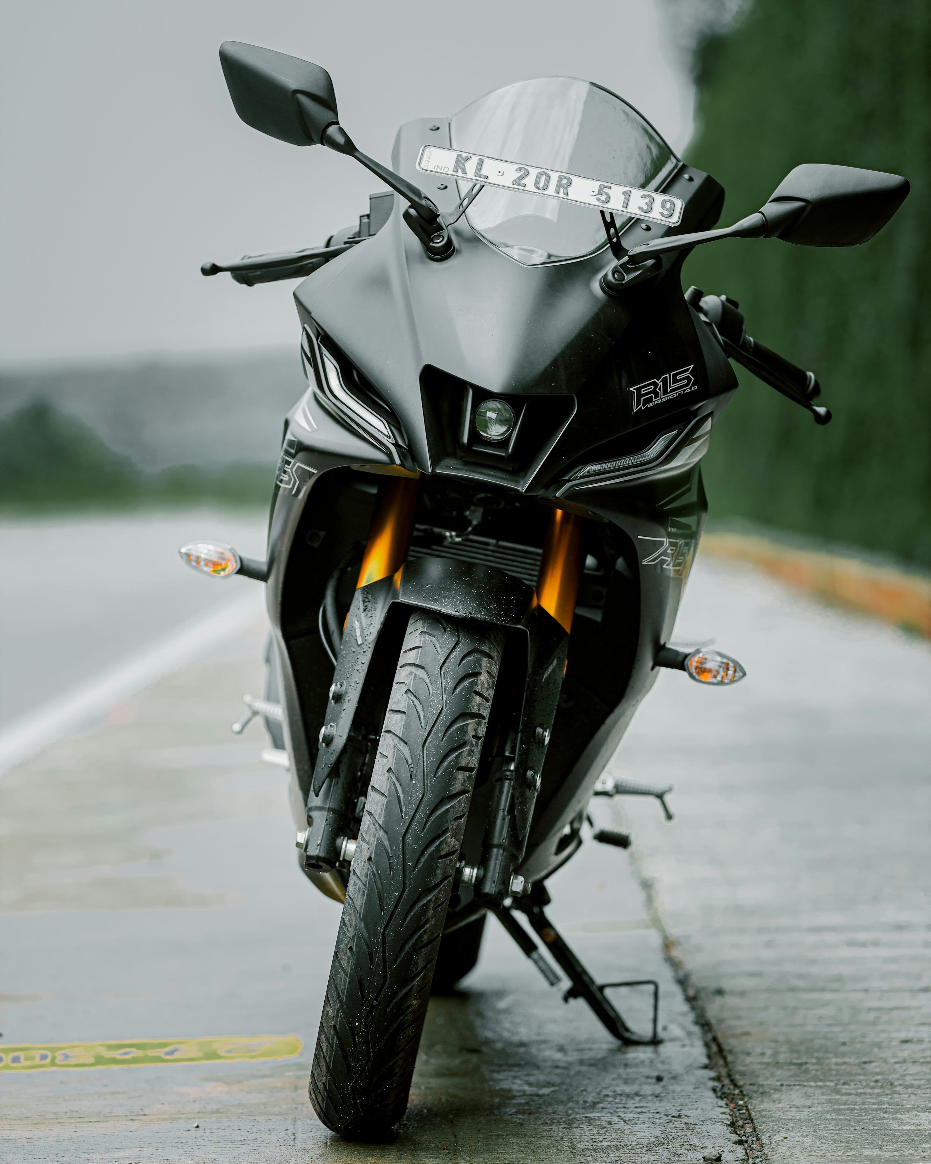 3000x3751 A motorcycle parked on the side of the road photo