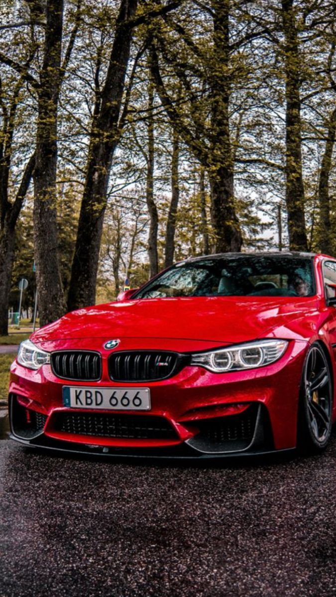675x1200 BMW M5 Red Dream Car. Red bmw sports car on grass, Red bmw m4 wallpaper, Red bmw m3 wallpaper