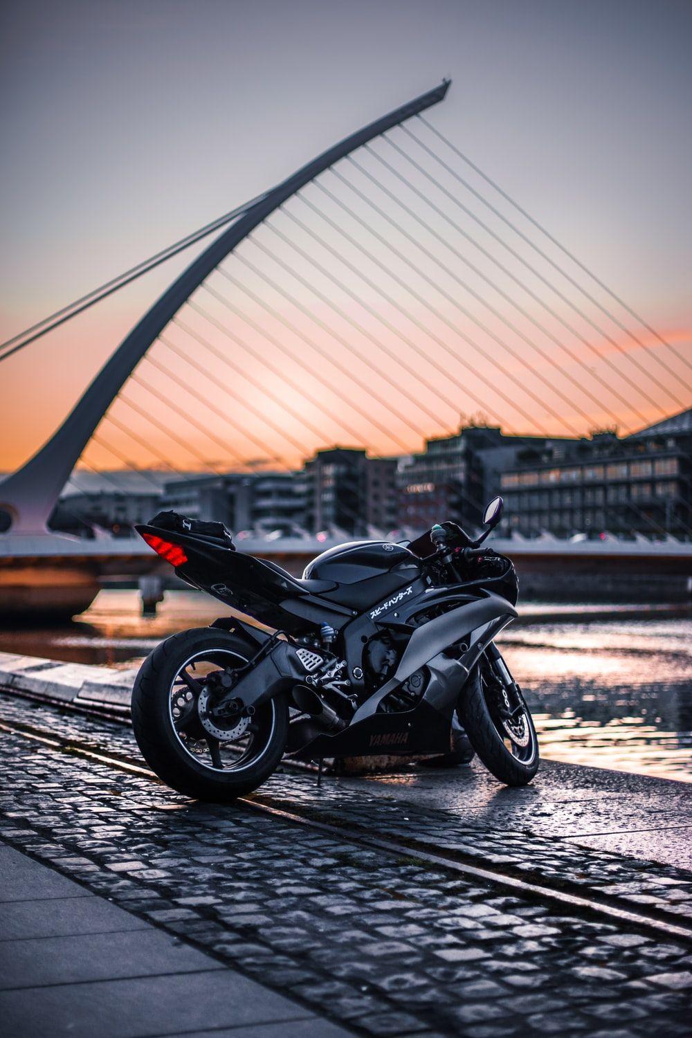 1000x1500 black sports bike at daytime photo