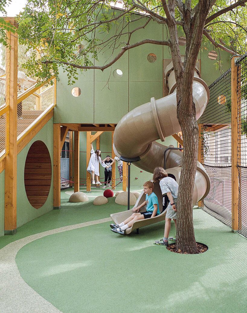 818x1035 studio KRAFT creates vertical play garden for budapest school