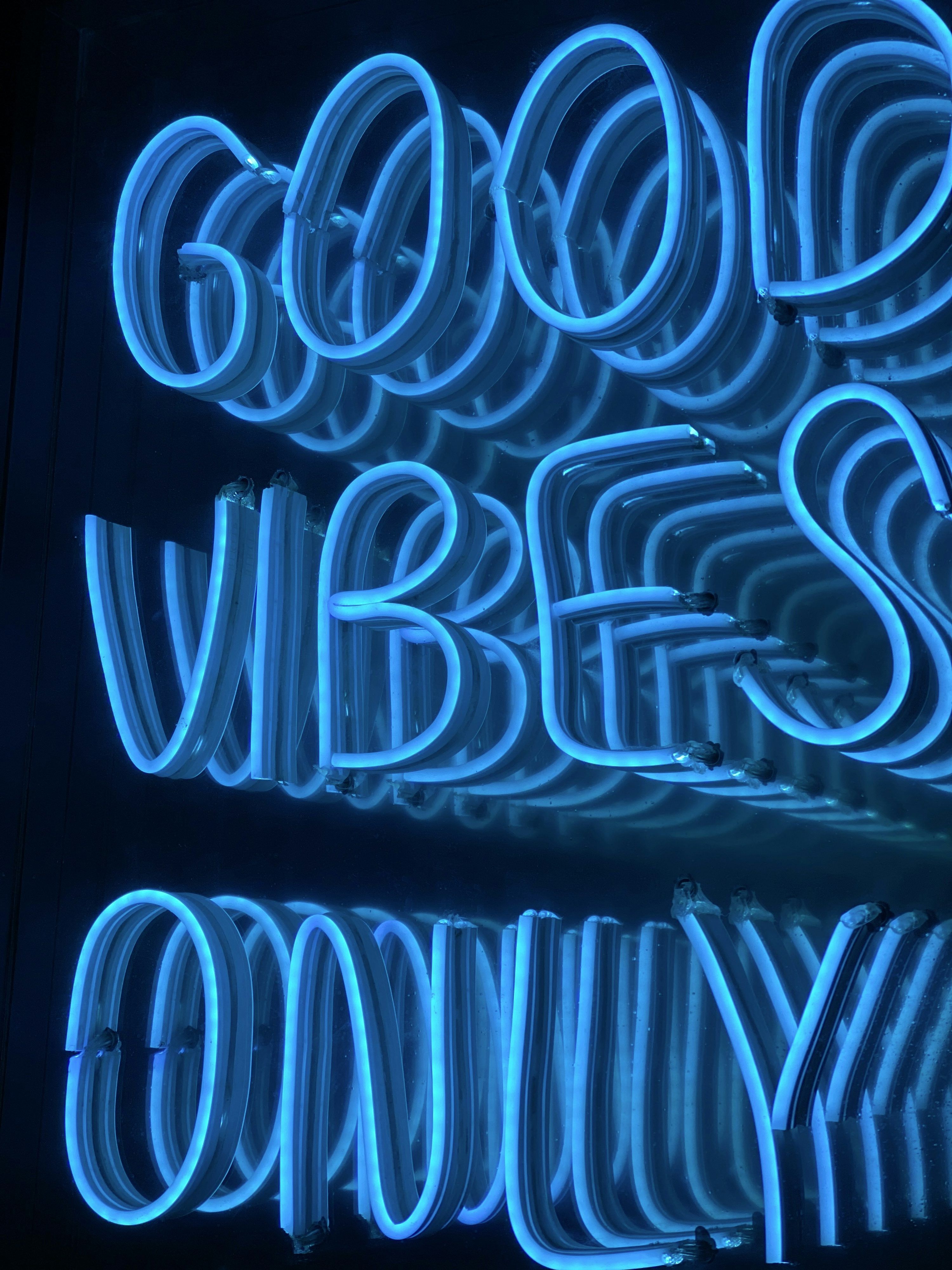 3000x4000 A neon sign that says good vibes only photo