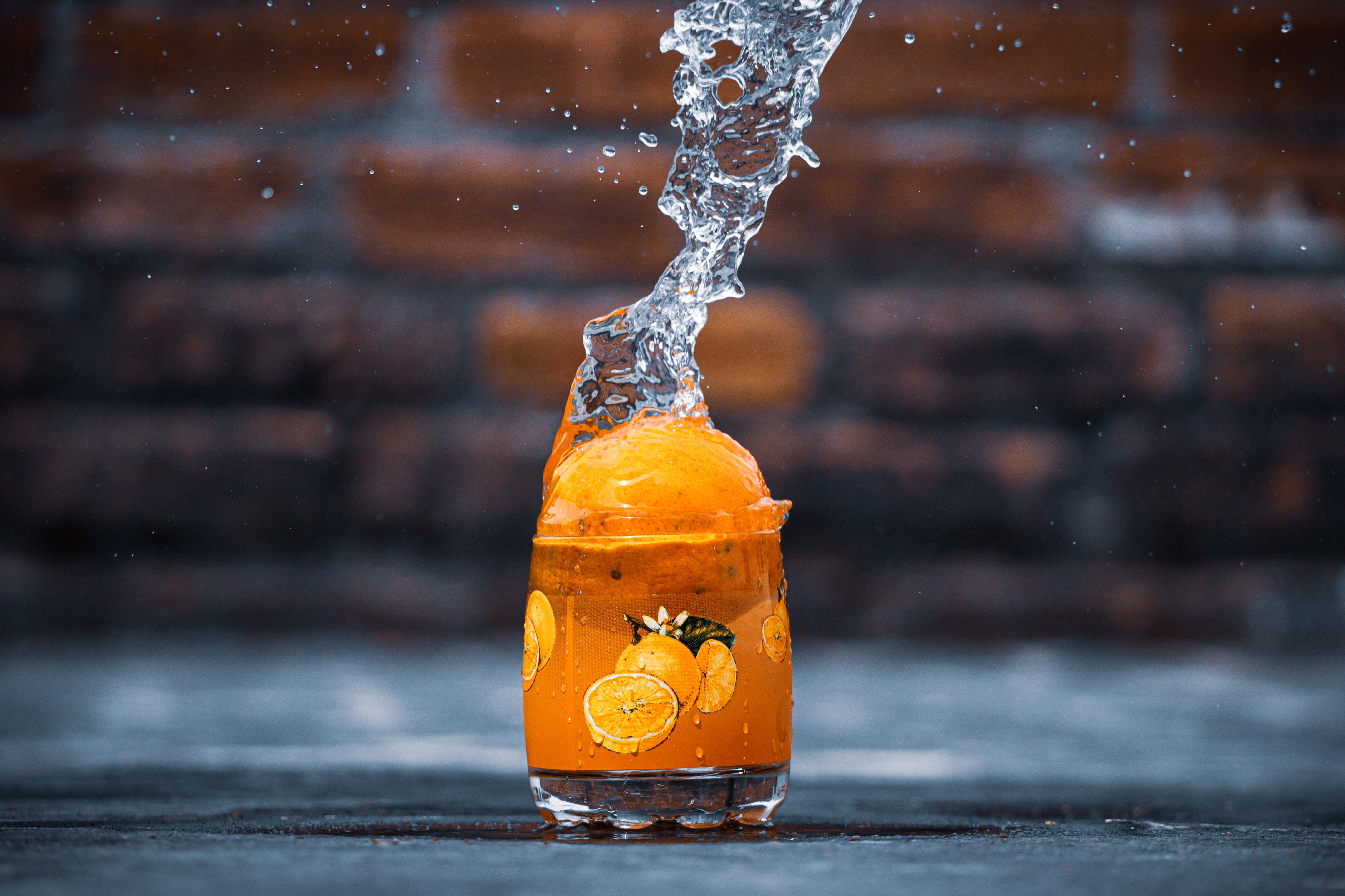 5915x3943 Clear Drinking Glass With Orange Liquid · Free