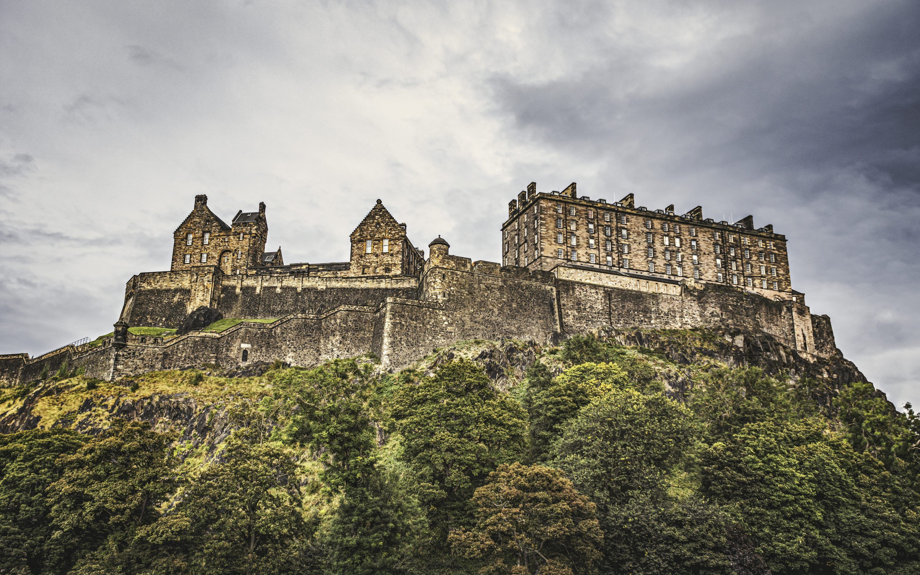 3000x1875 A castle on top of a hill surrounded