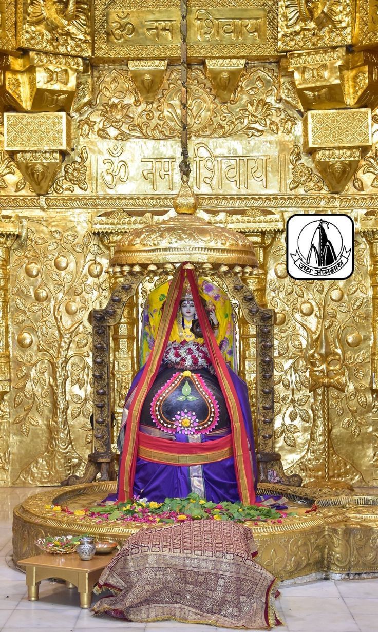 736x1231 Ganesha Statue in Front of Ornate Gold Wall. Kandariya mahadev temple history, Somnath jyotirlinga, Somnath
