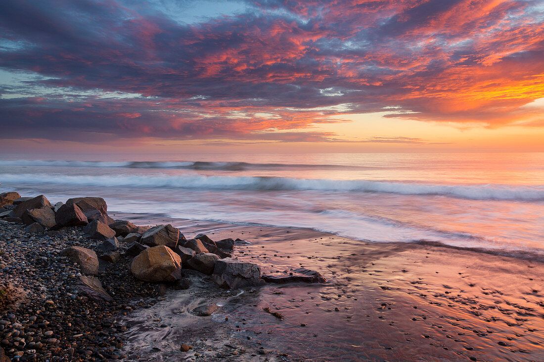 1100x733 Sunset on the beach on the west coast of