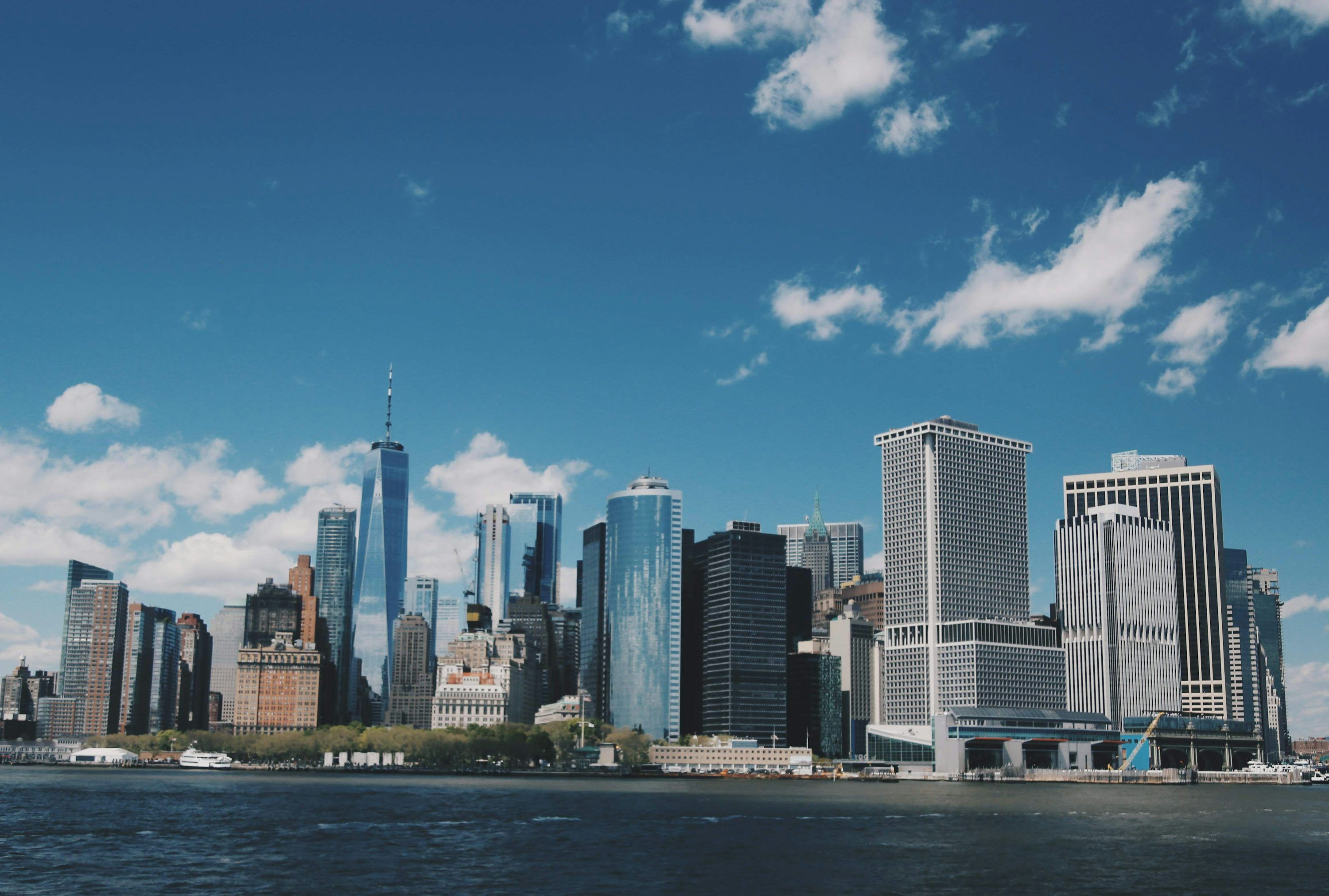3000x2023 City skyline under blue sky during daytime photo