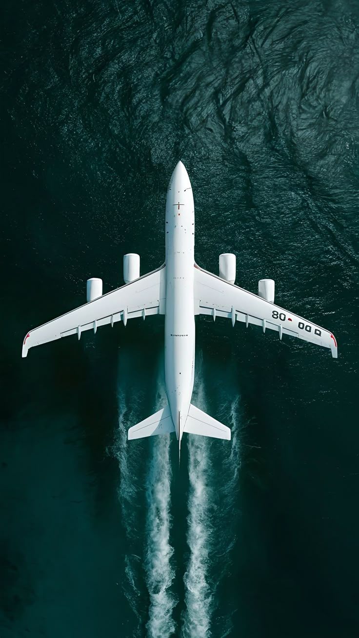 736x1308 Airplane from above. Airplane top view wallpaper, Modern aircraft photography, 4k