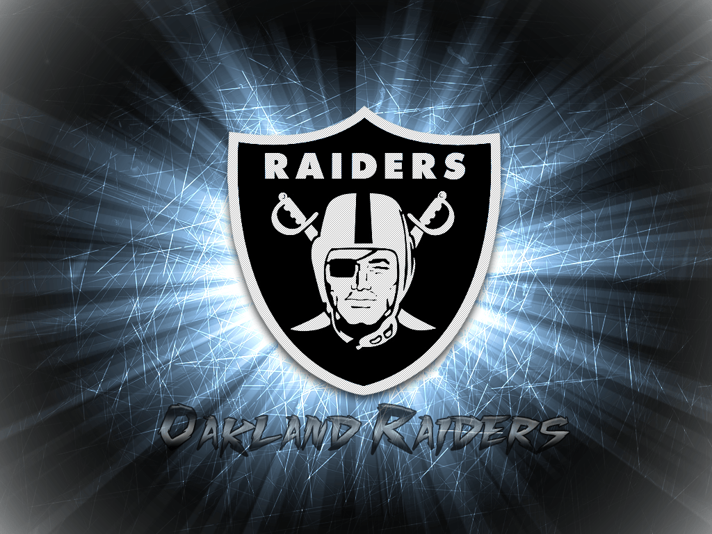 Download Oakland Raiders Logo On City Buildings Wallpaper