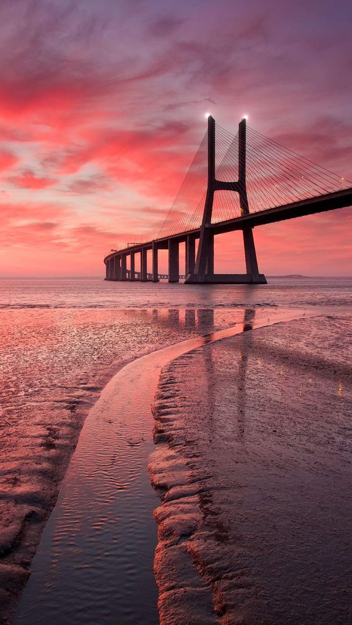 720x1280 Vasco da Gama Bridge, sunset, Tagus, river, Portugal wallpaper. Vasco da gama, Sunset wallpaper, Bridge photography