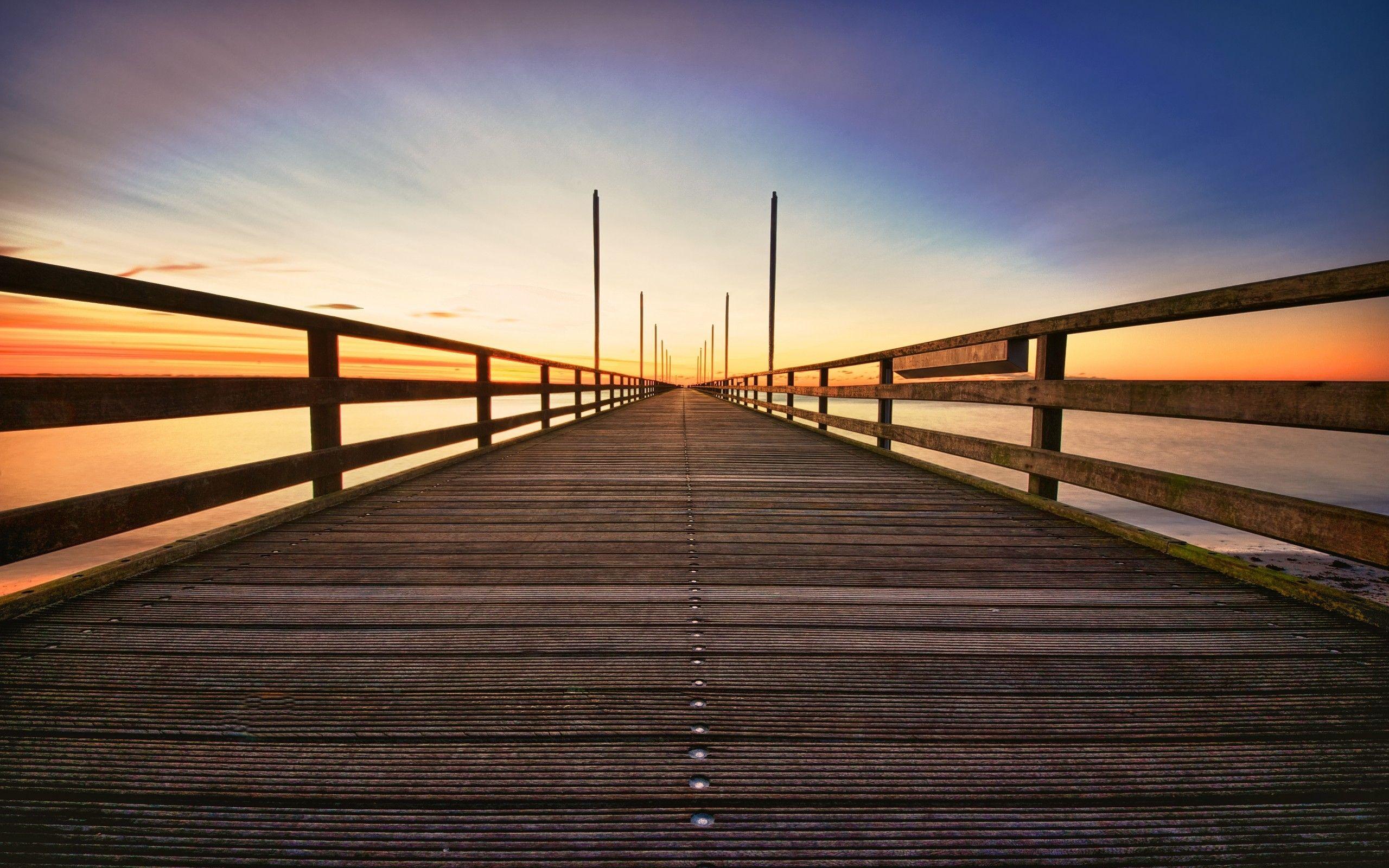 2560x1600 Download 2560x1600 Bridge, Sunset, Sky, Perspective, Horizon, Sea Wallpaper for MacBook Pro 13 inch