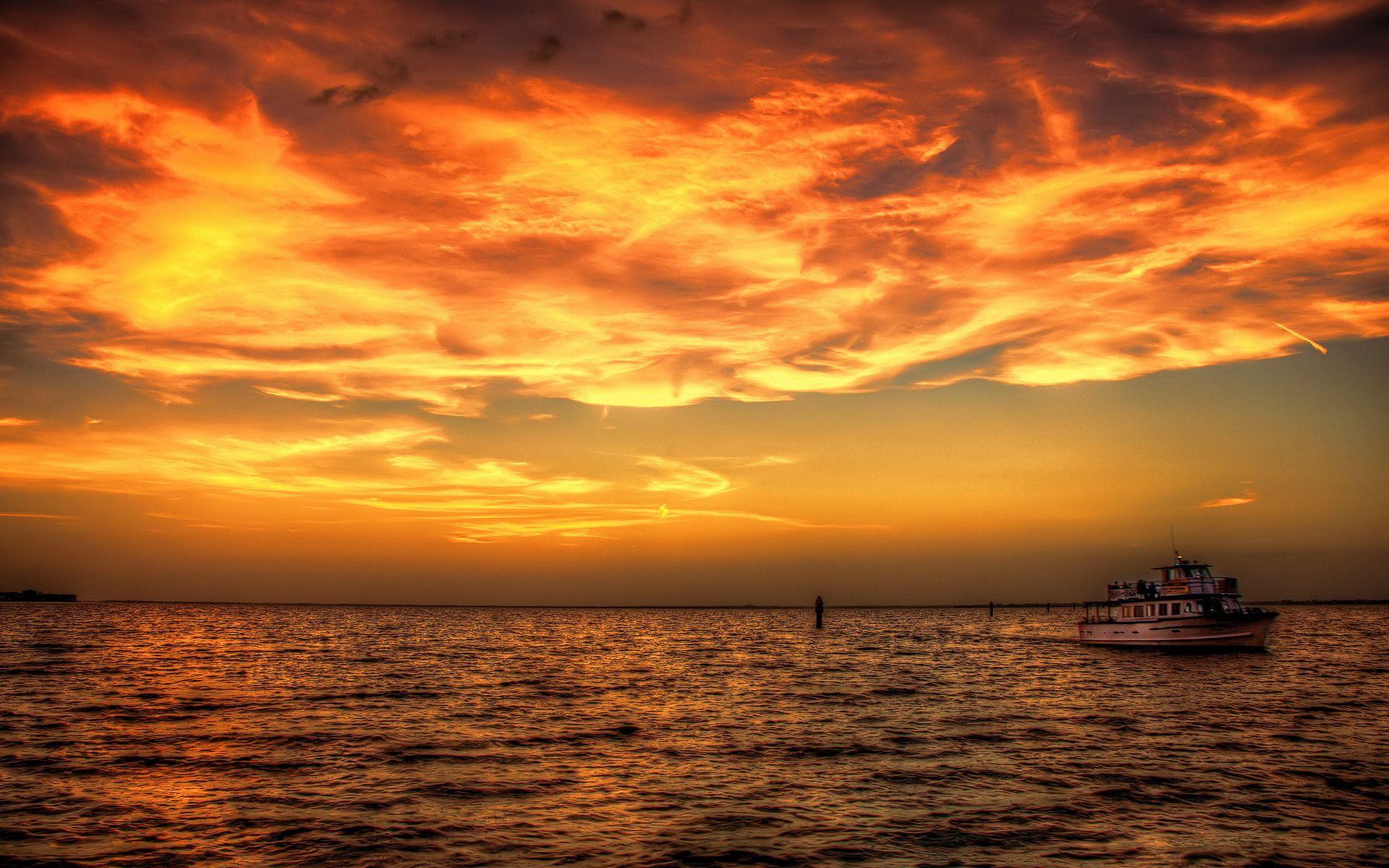 1920x1200 Sunset sea ship ocean sky clouds boat wallpaperx1200