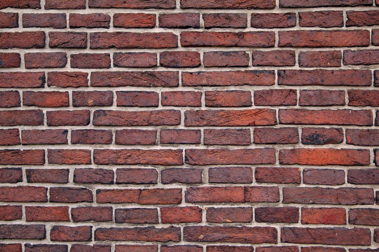 1280x853 FREE Brick Wall Background in PSD. AI in PSD