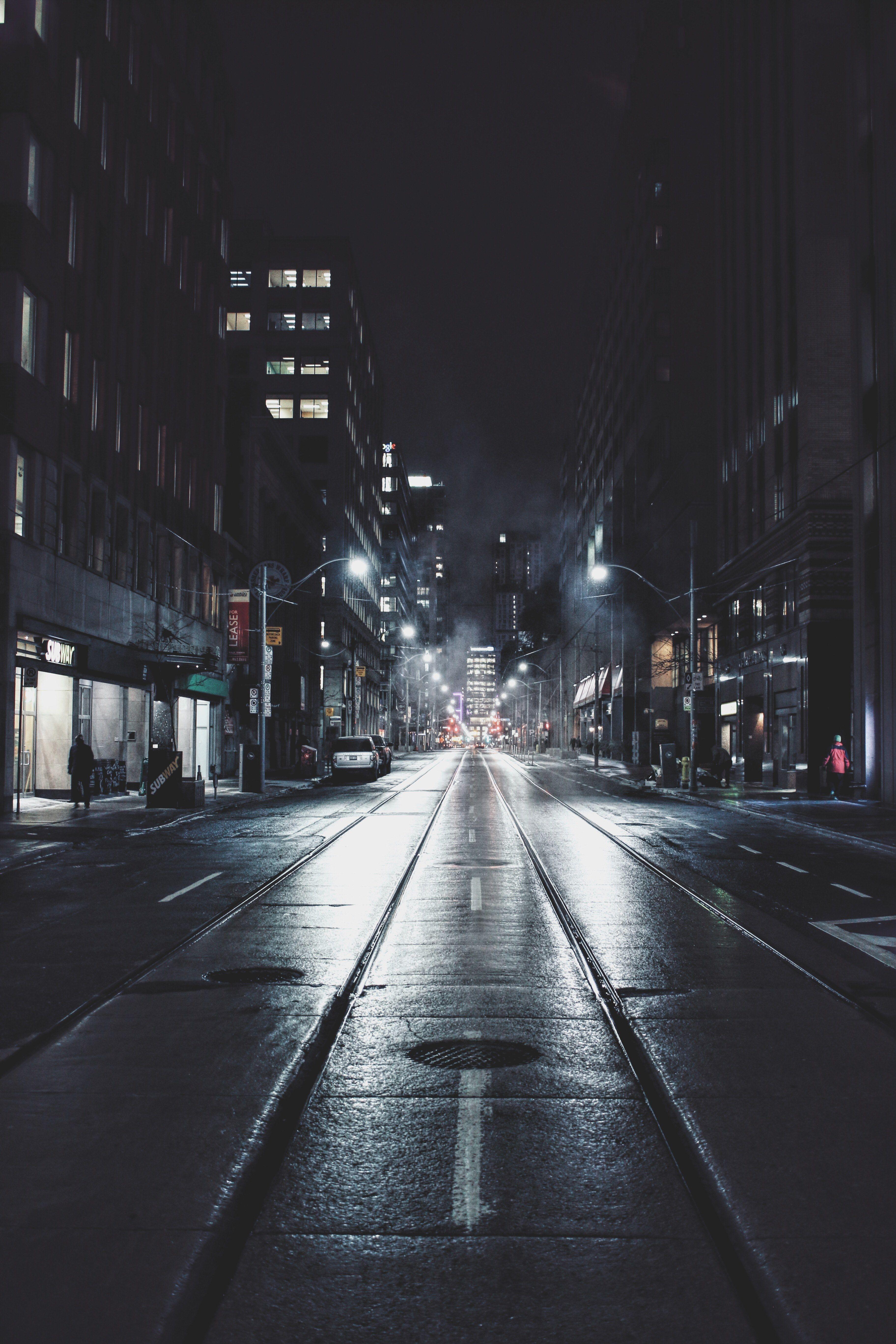3648x5472 Wallpaper / street views on a dark rainy night in downtown toronto, glistening pavement 4k wallpaper