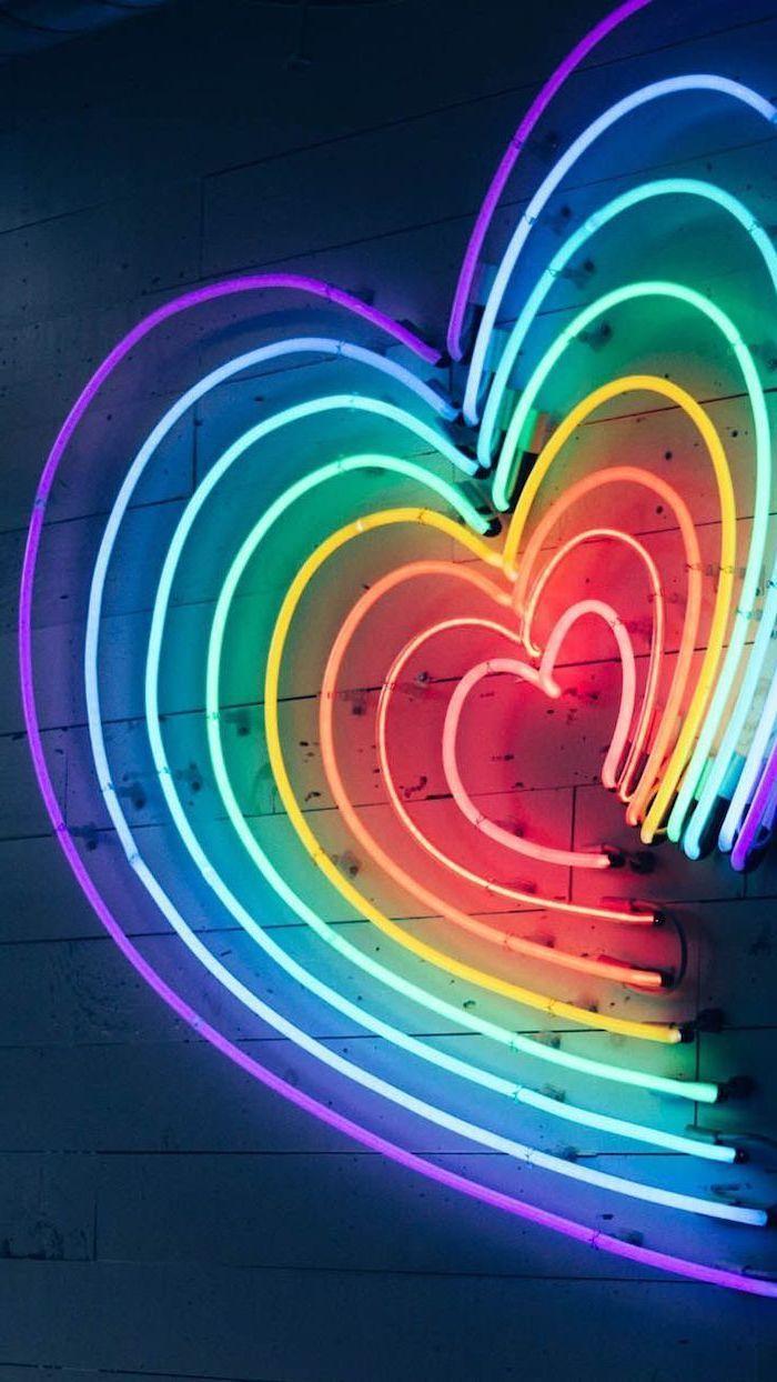 700x1244 Heart Shaped Neon Lights In The Colors Of The Rainbow Aesthetic Phone Background Purple Blue Green Ye. Neon Wallpaper, Neon Light Wallpaper, Aesthetic Wallpaper