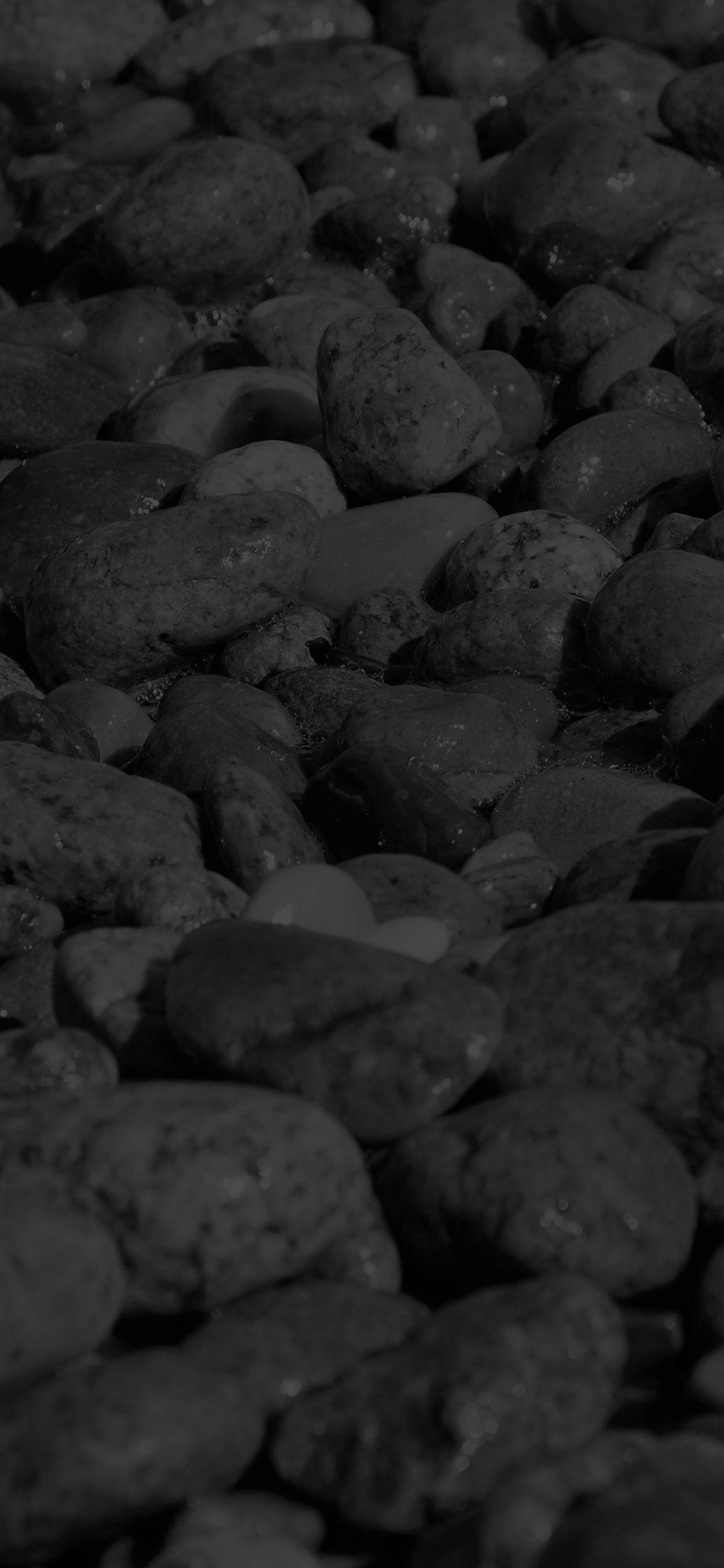 1125x2436 Stone Rocks Beach Nature Pattern Dark Wallpaper