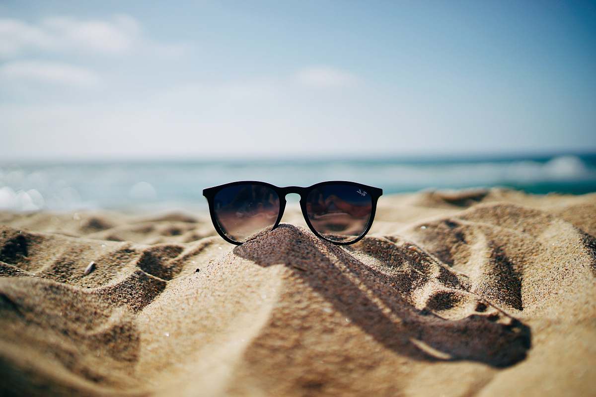 1200x800 Sunglasses Black Ray Ban Wayfarer Sunglasses On Beach Sand Beach Wallpaper Image
