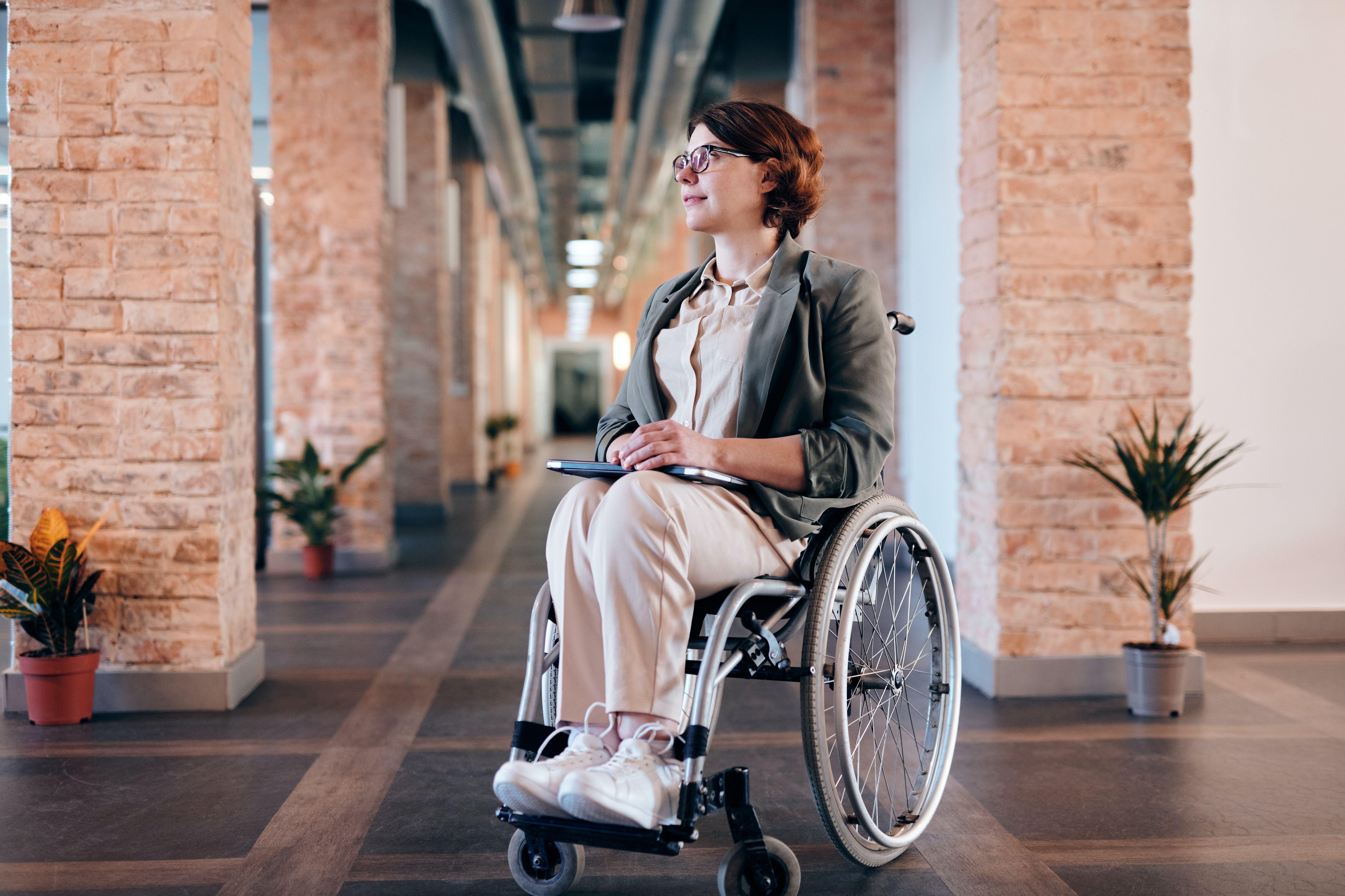 6000x4000 Woman in Gray Coat Sitting on Wheelchair · Free