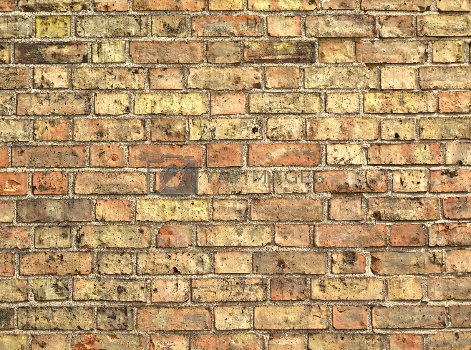 1600x1191 Yellow brickwork as a grunge wallpaper background Royalty Free Stock Image. , Royalty Free Image, Vectors, Footage