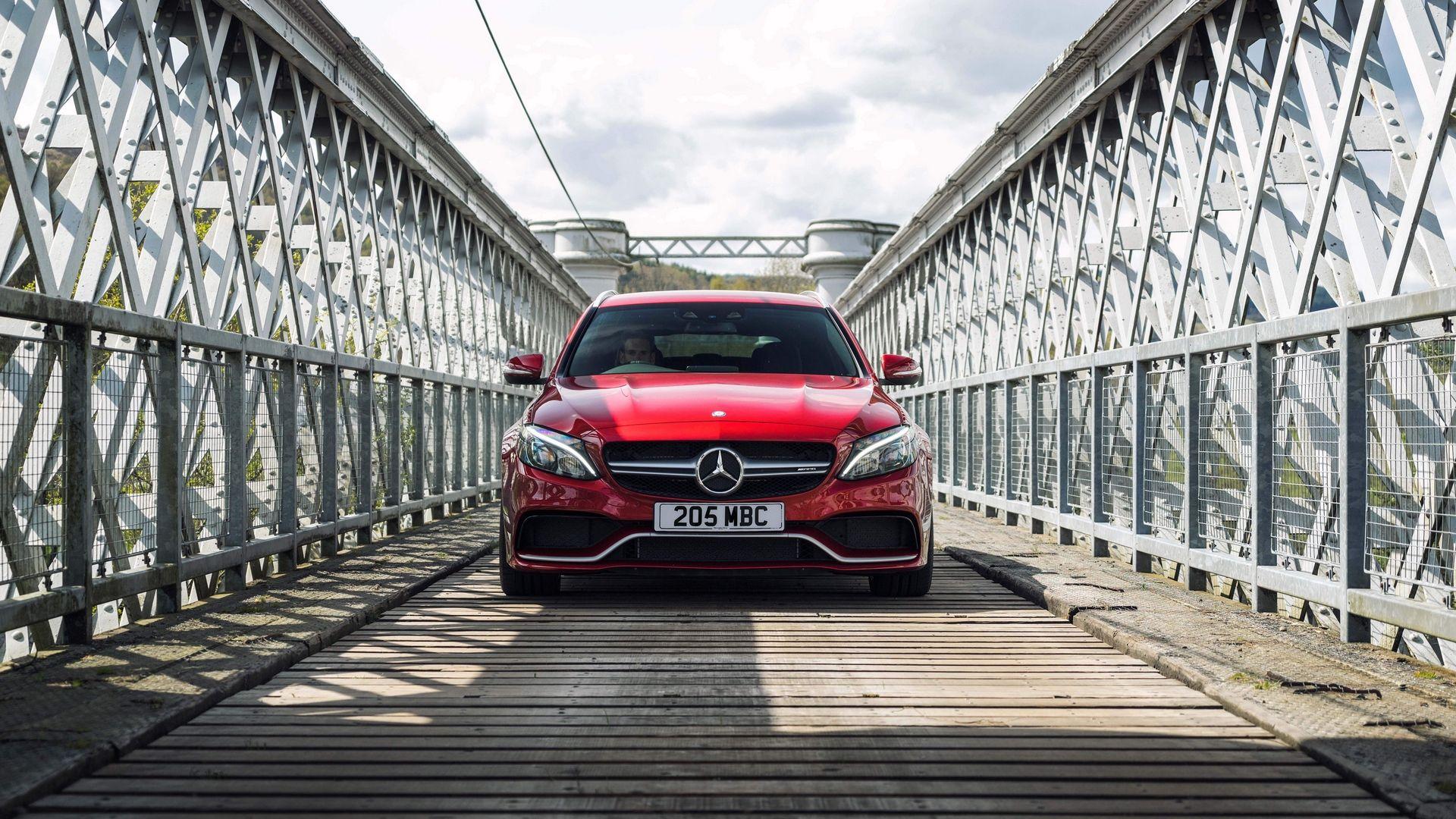 1920x1080 Bridge View of Red Mercedes AMG C63 Wallpaper