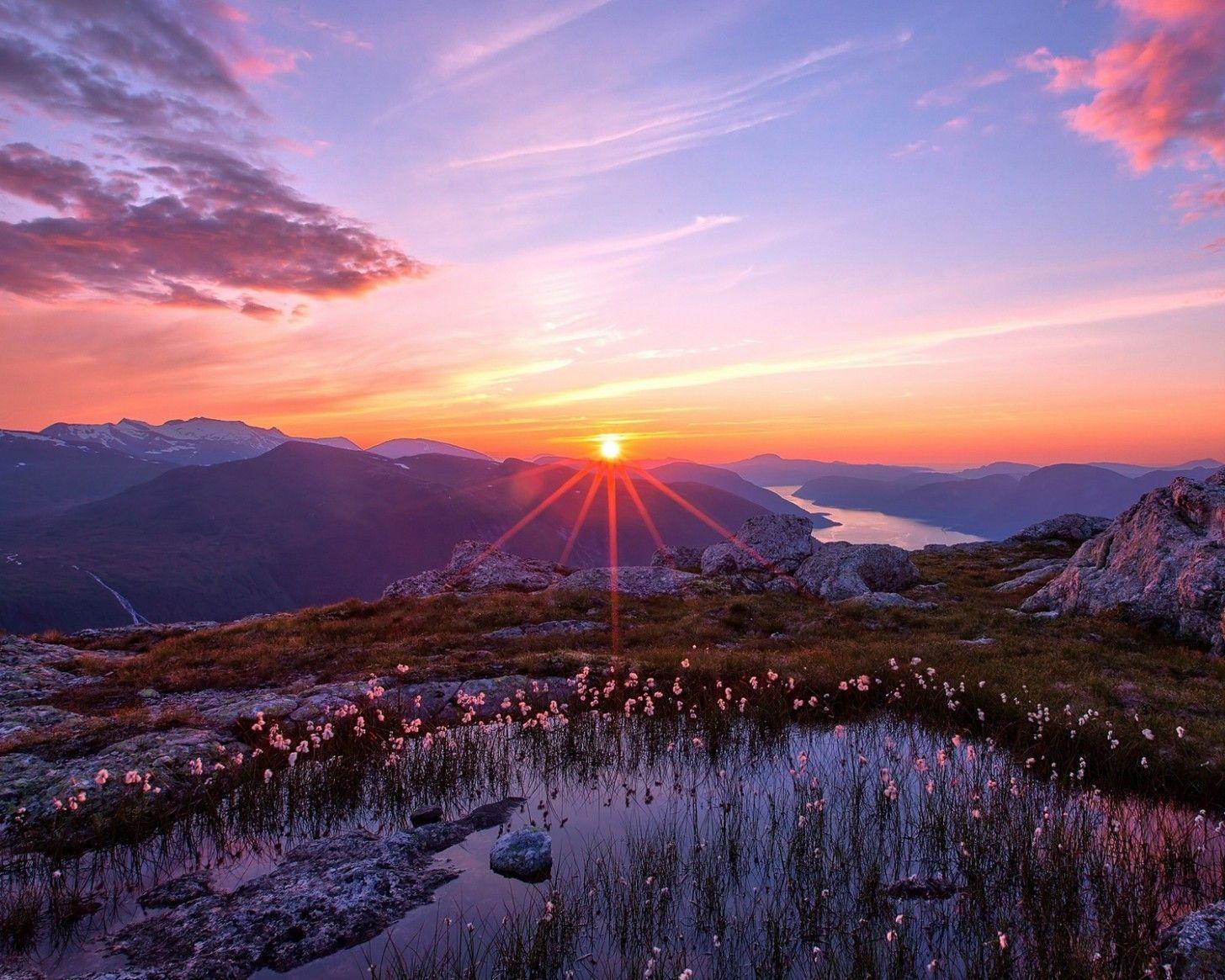 1456x1165 Download 1456x1165 Sunrise, Hills, Mountain, Flowers, Sky, Clouds, Rocks Wallpaper
