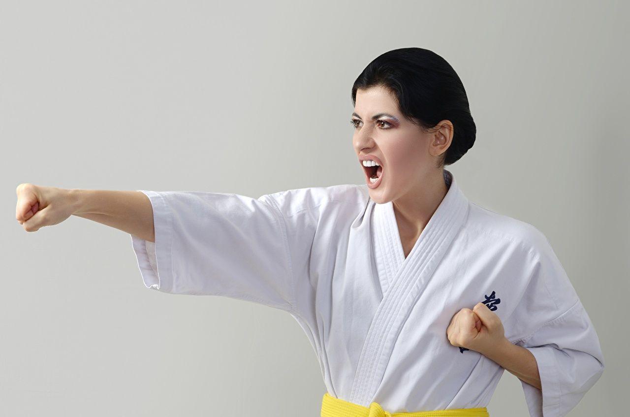 1280x847 Desktop Wallpaper Girls Hands Brunette girl Uniform Karate To hit