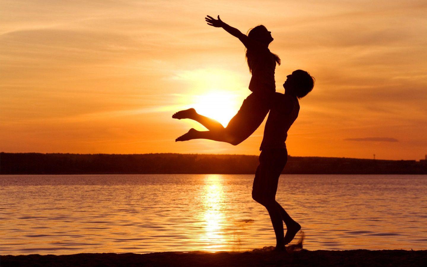 1440x900 Lovely Couple doing Romance on Beach at Sunset Time HD desktop wallpaper : Widescreen : High Definition